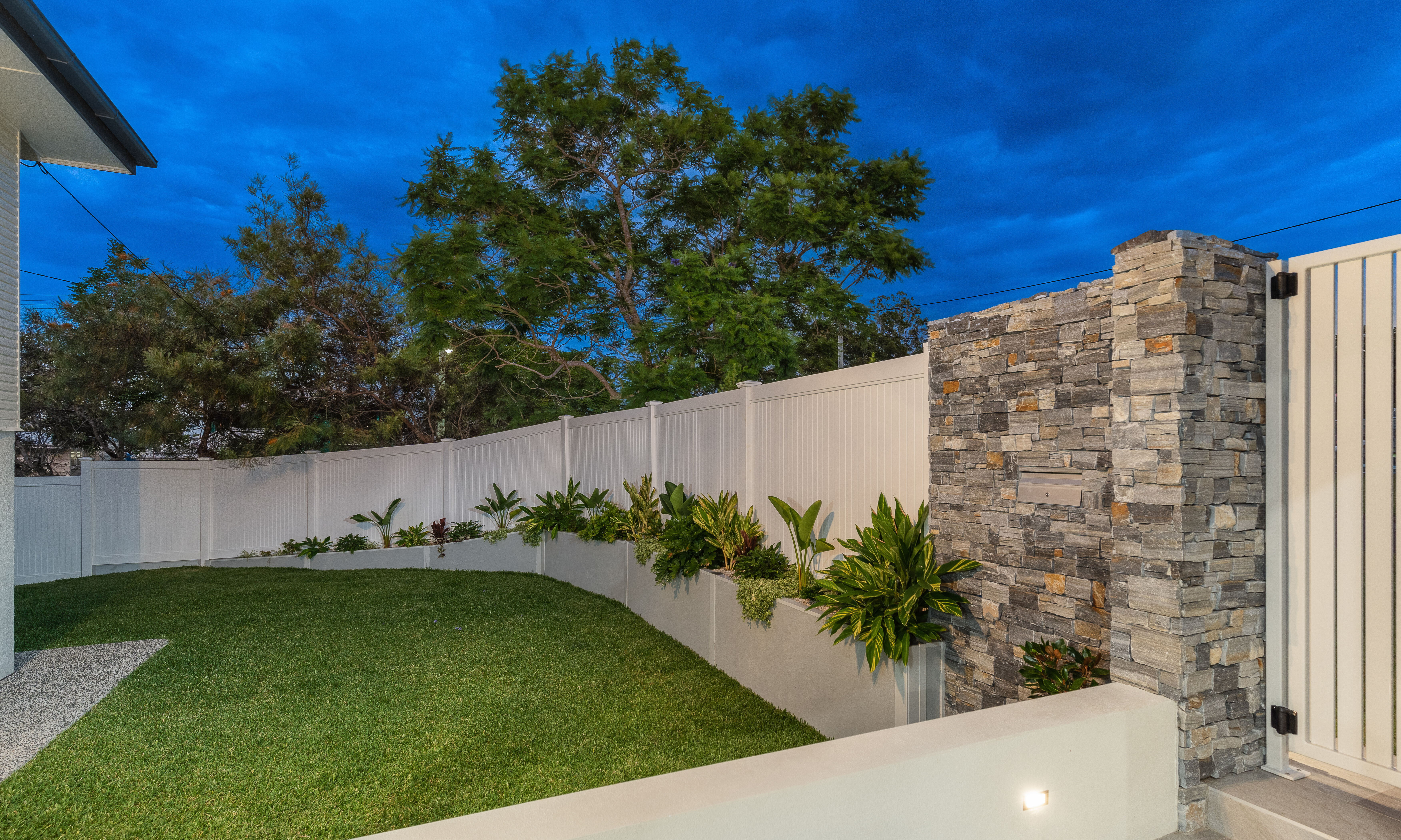 Front yard-stone cladding-lights