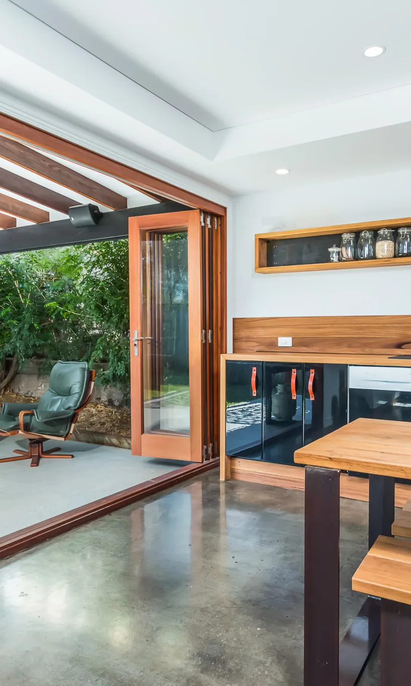 Timber Bifold Doors off kitchen to parents retreat
