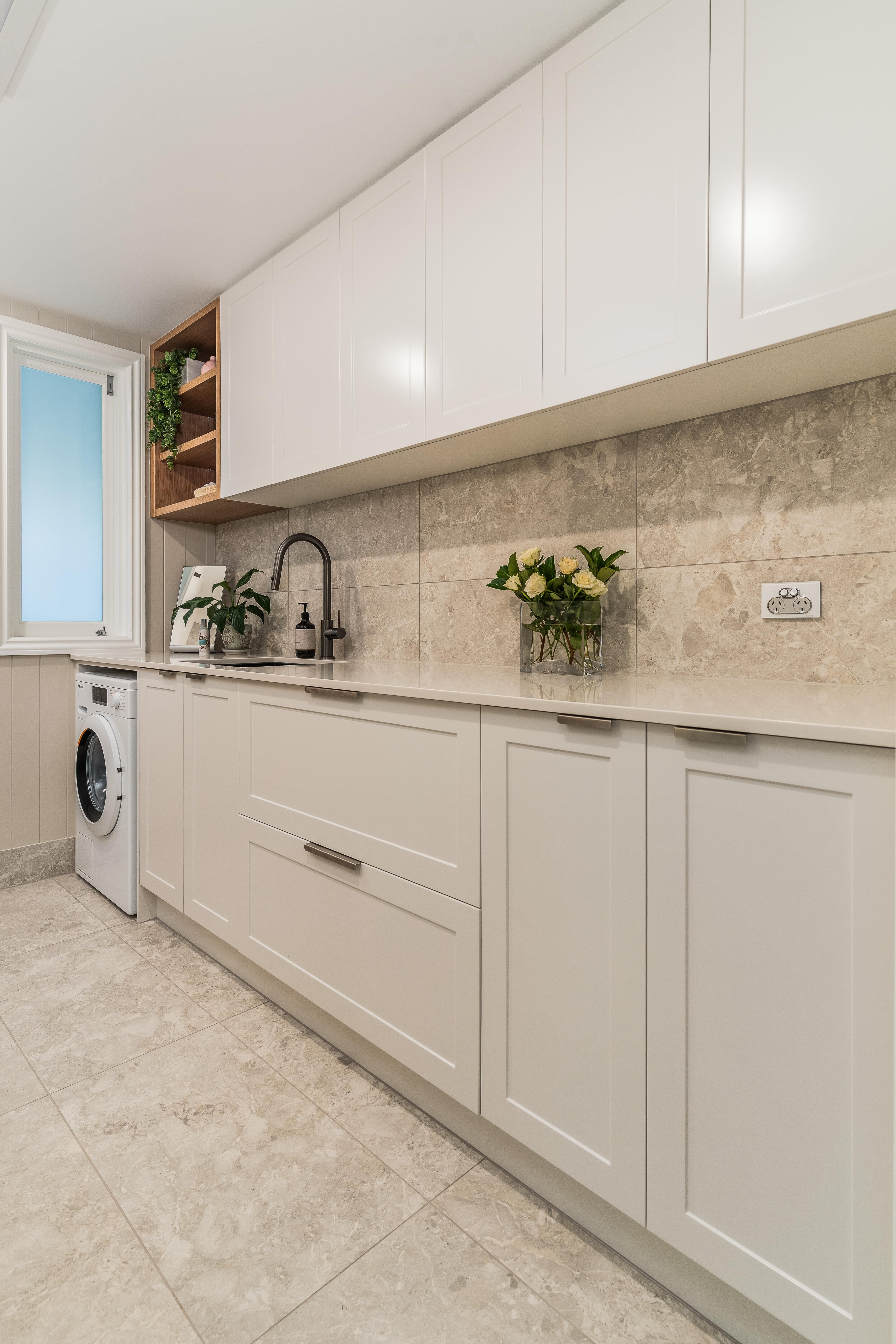 Laundry, 2pac cabinetry, caesarestone, full height tiles - Byrnes St 