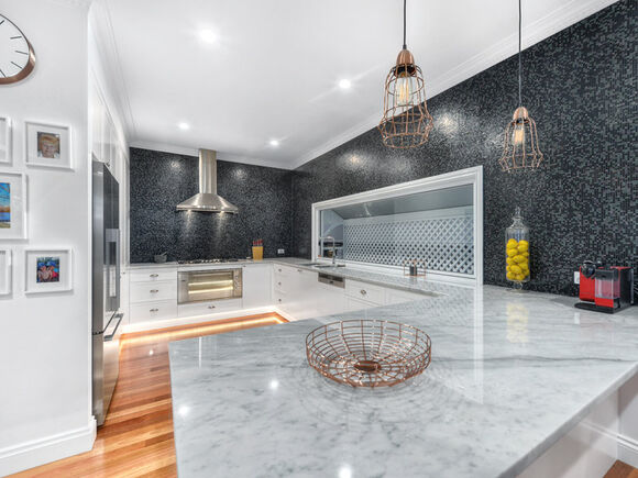 white kitchen-marble top-mosaic tiles