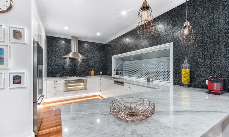 white kitchen-marble top-mosaic tiles