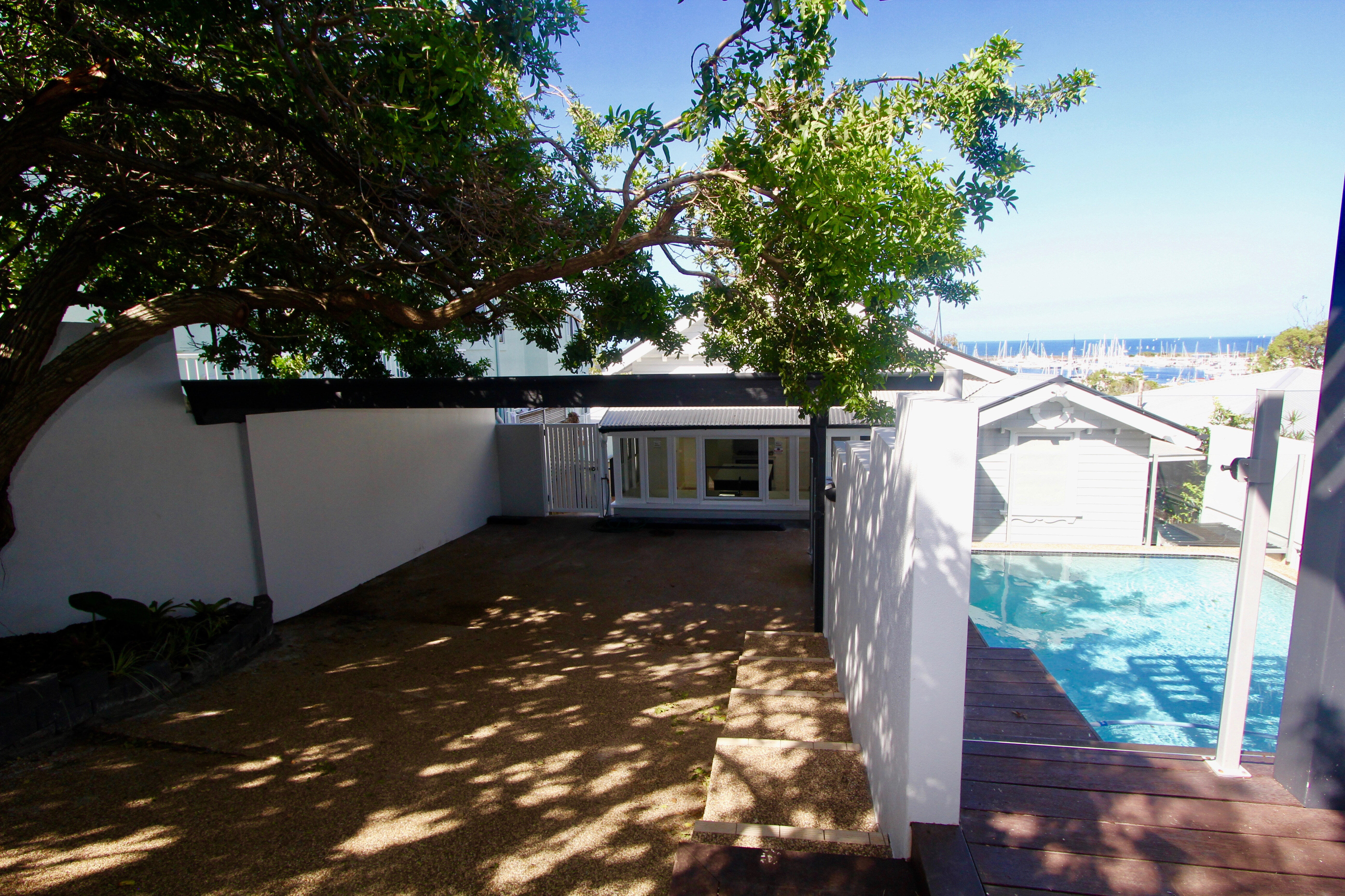 Carport and in-ground pool