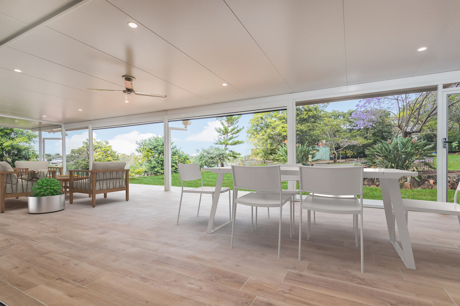 Patio with insulated roof and plank tiles on floor