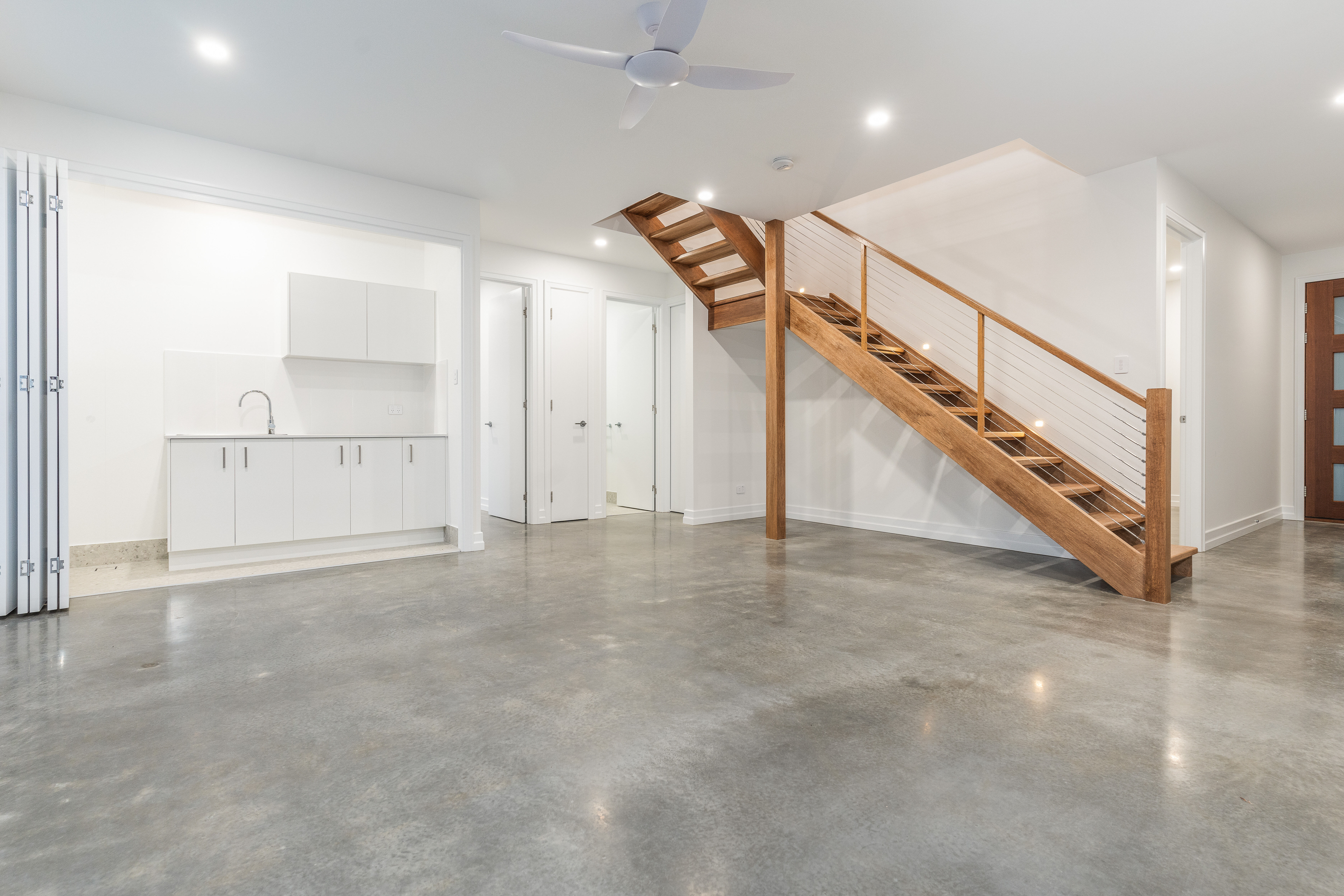 polished timber floors,laundry-stairs-wire balustrade-timber handrail