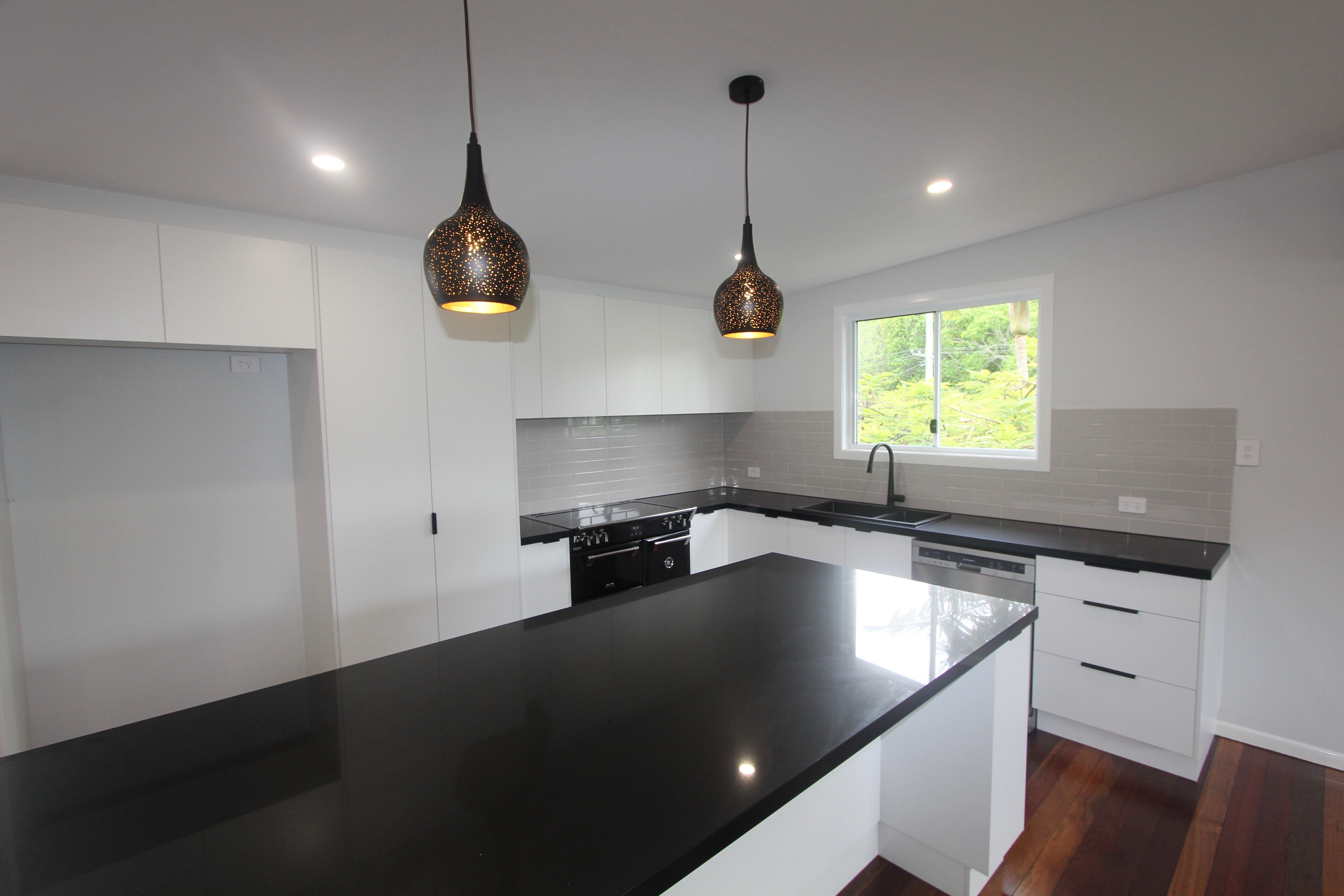 Black and white kitchen with subway tiles