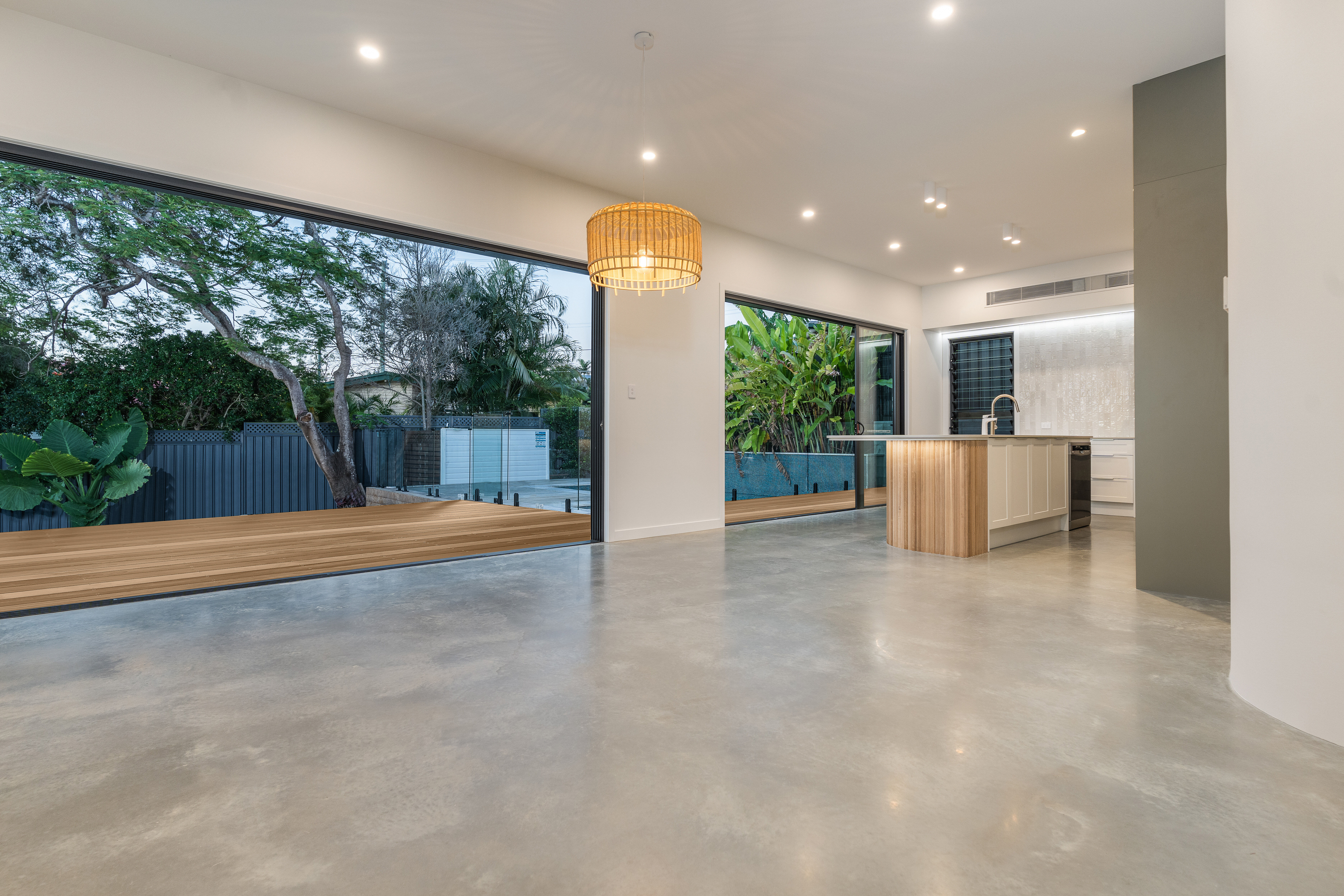 Living room-polished floors- Stacker door-pool-deck