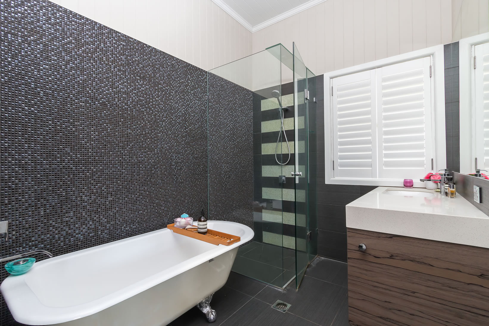 bathroom-clawfoot bath-mosaic tiles-splashback-vanity-shutters