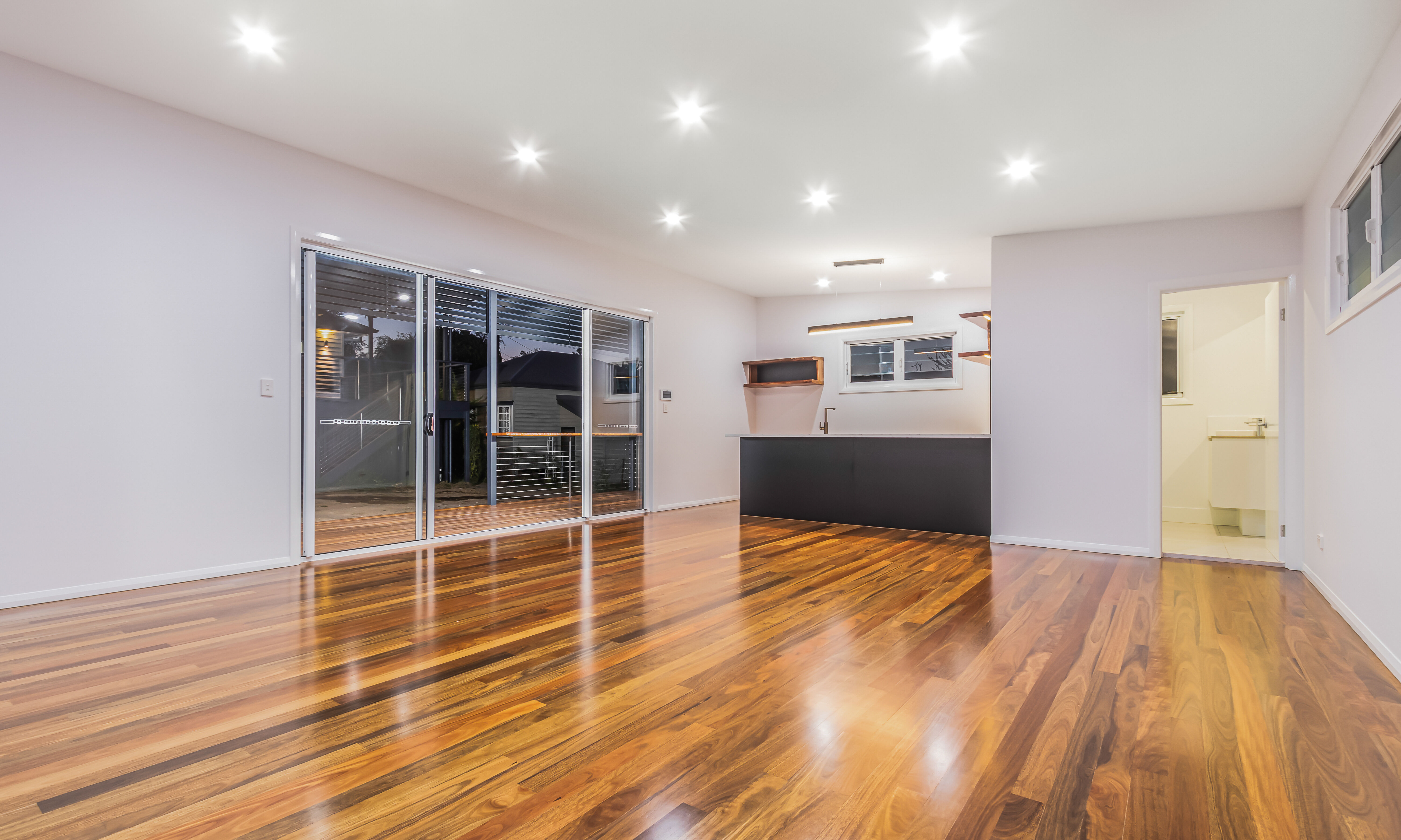 Pool house-black cabinetry-timber floors