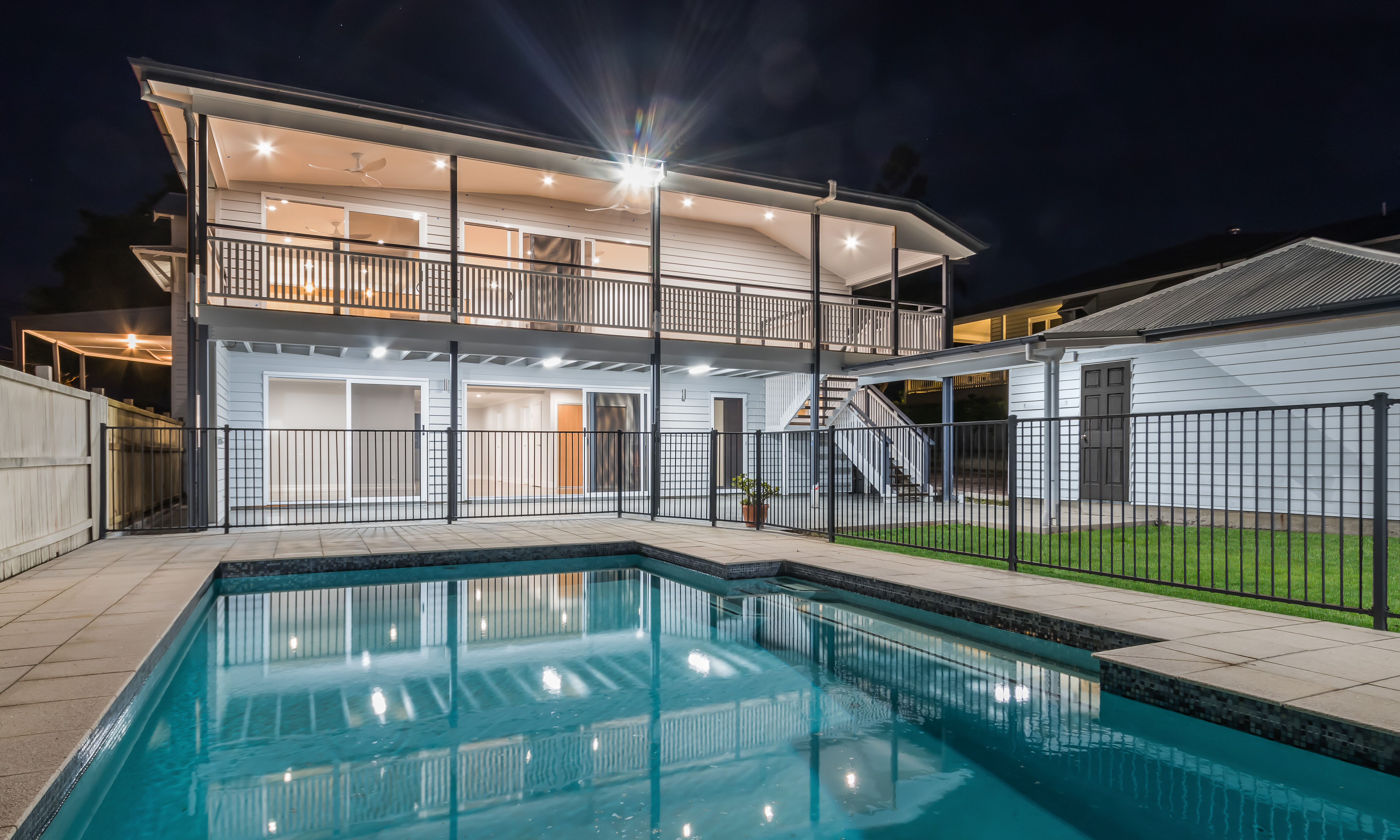 Inground Pool with aluminium balustrade and Deck with timber balustrade