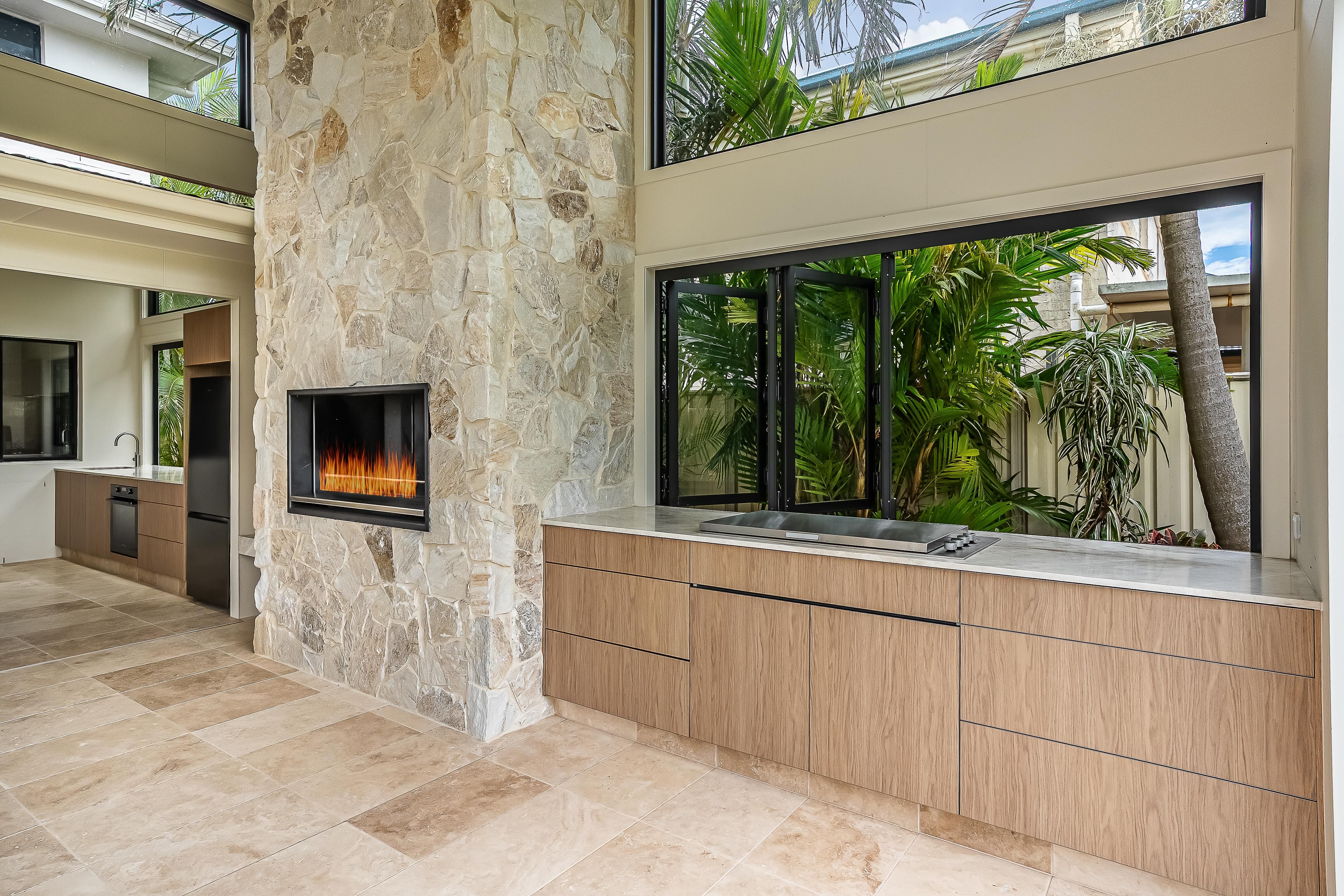 Sweetapple - Outdoor Kitchen, Taj Mahal Stone Tops, Polytec cabinetry, Stone Chimeny