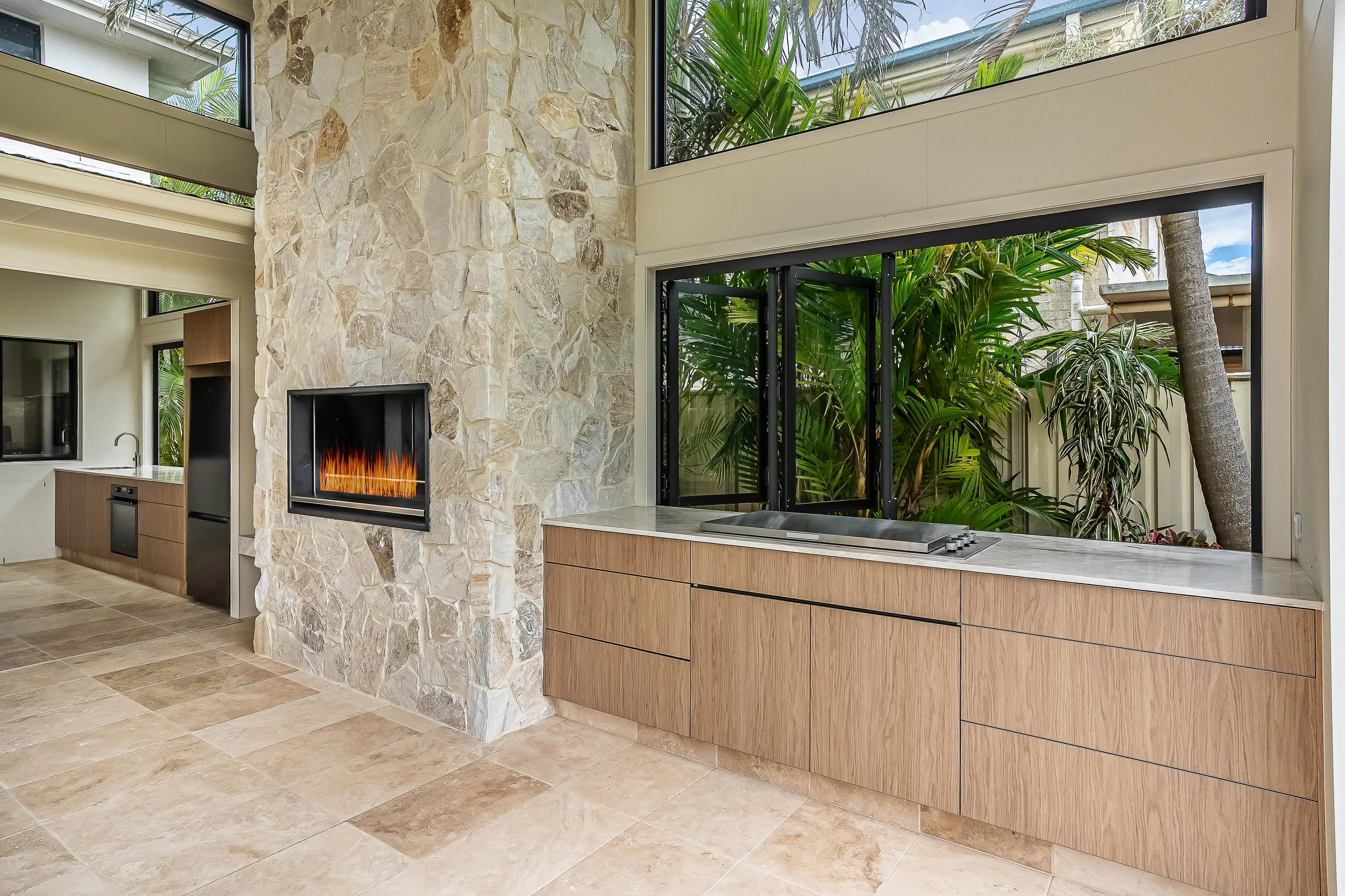 Sweetapple - Outdoor Kitchen, Taj Mahal Stone Tops, Polytec cabinetry, Stone Chimeny