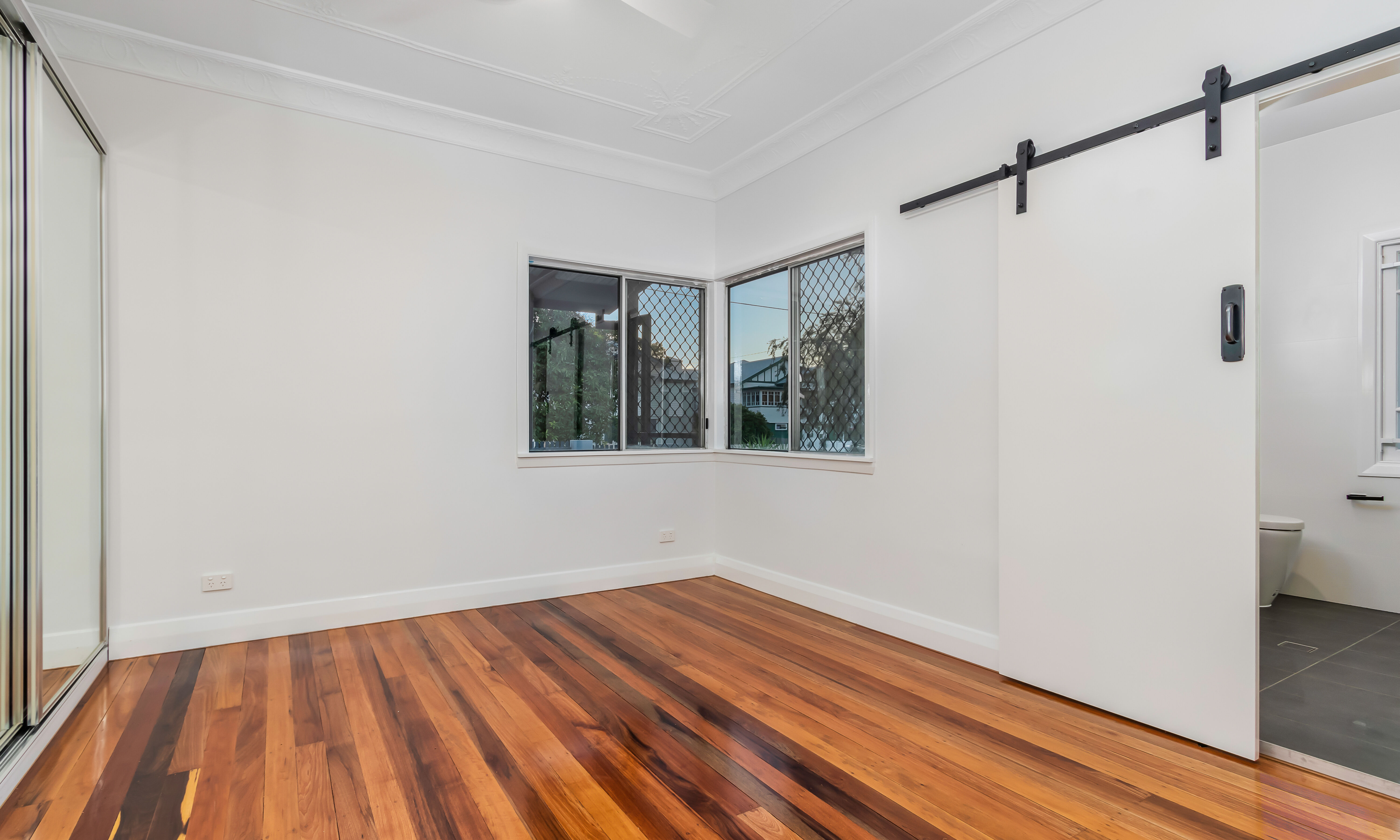 barn doors-ornate plaster ceilings-timber floors