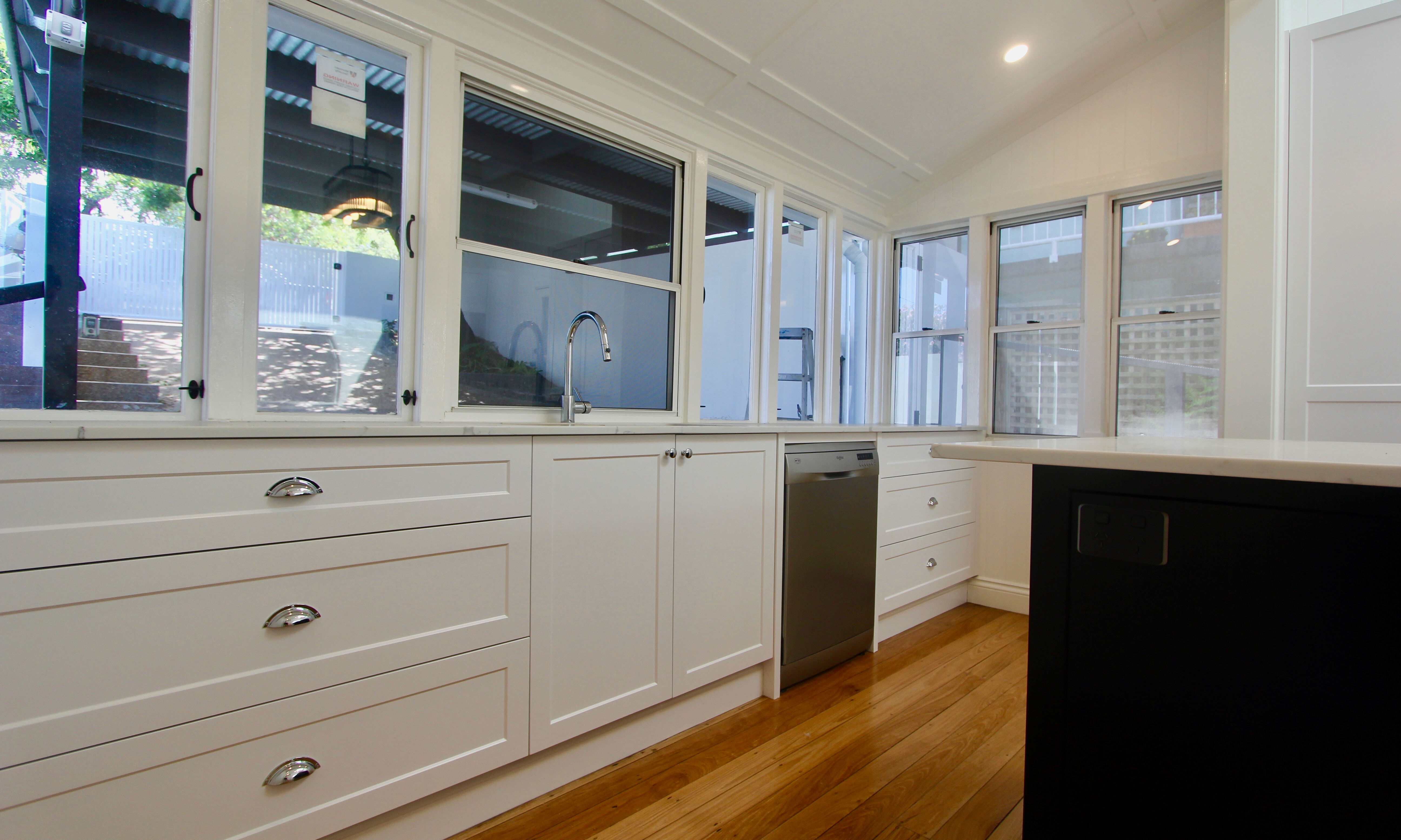 White kitchen with marble top