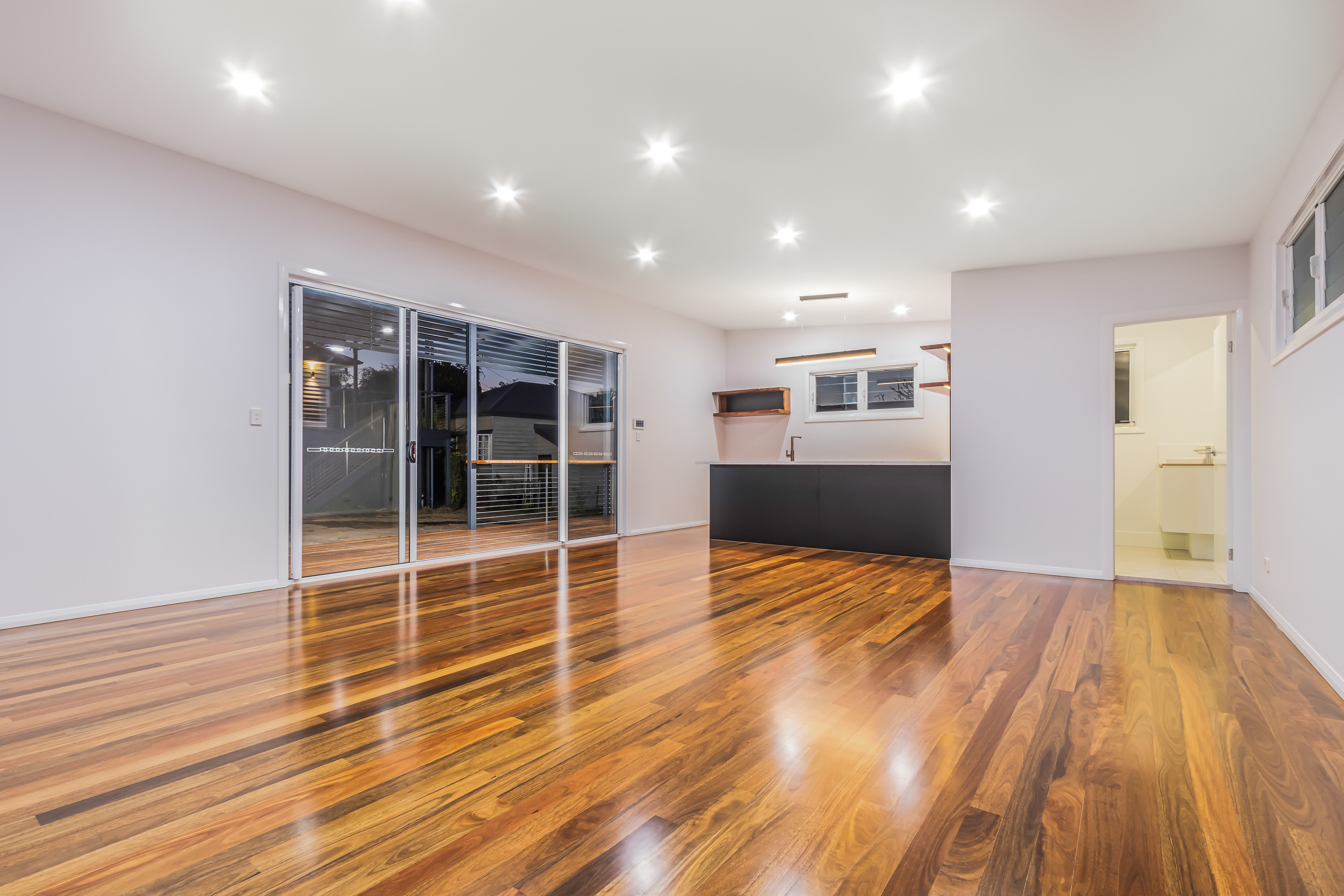 Pool house-black cabinetry-timber floors