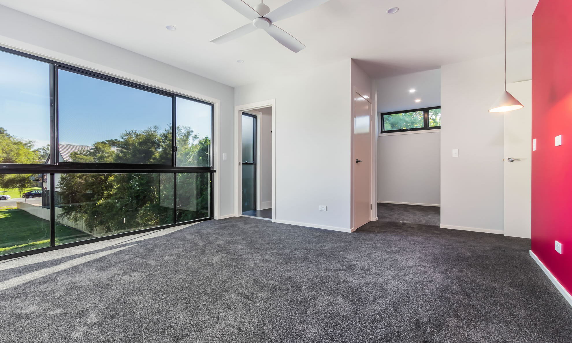 Wool carpet-black windows-bedroom