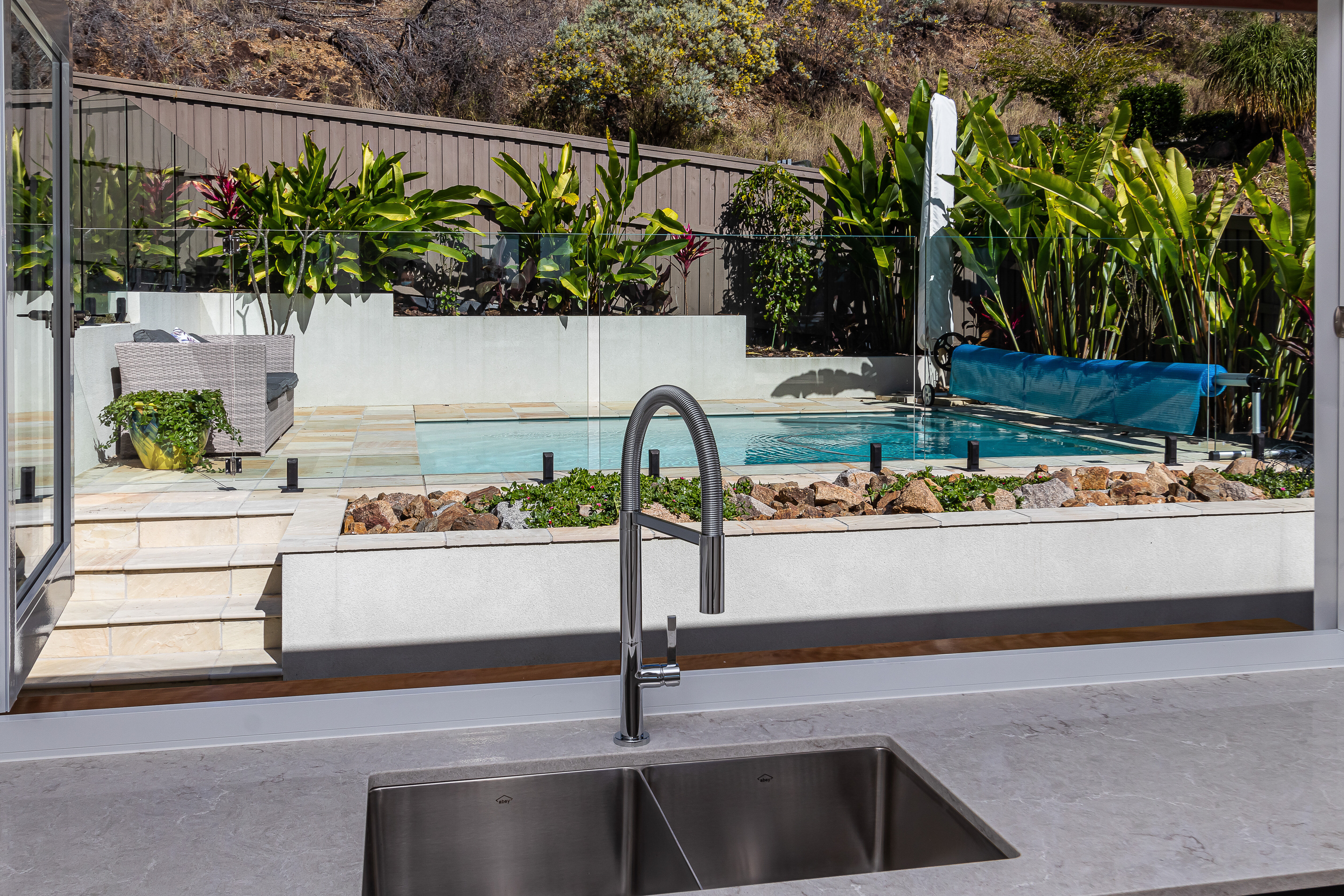 Bifold window overlooking pool