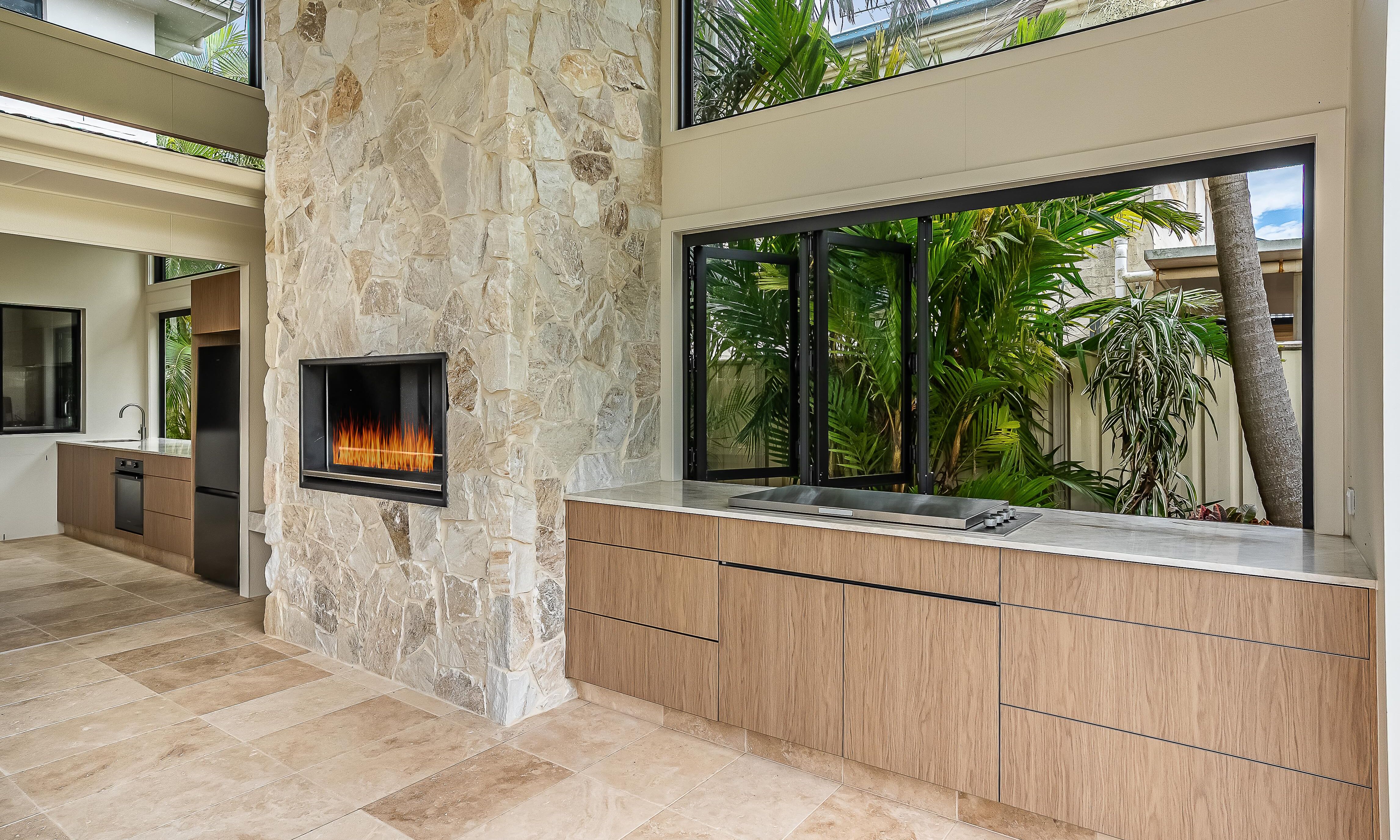 Sweetapple - Outdoor Kitchen, Taj Mahal Stone Tops, Polytec cabinetry, Stone Chimeny