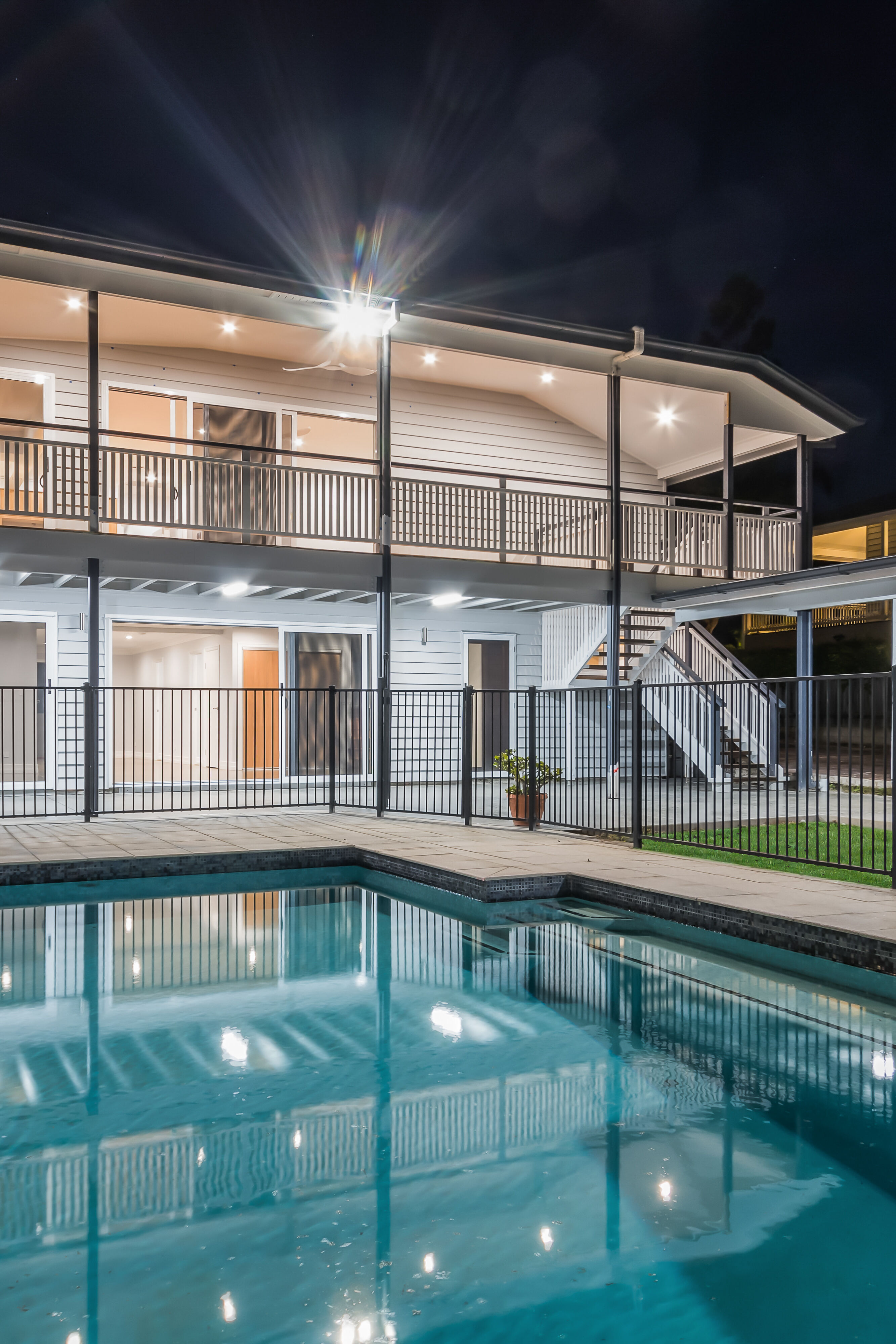 Inground Pool with aluminium balustrade and Deck with timber balustrade