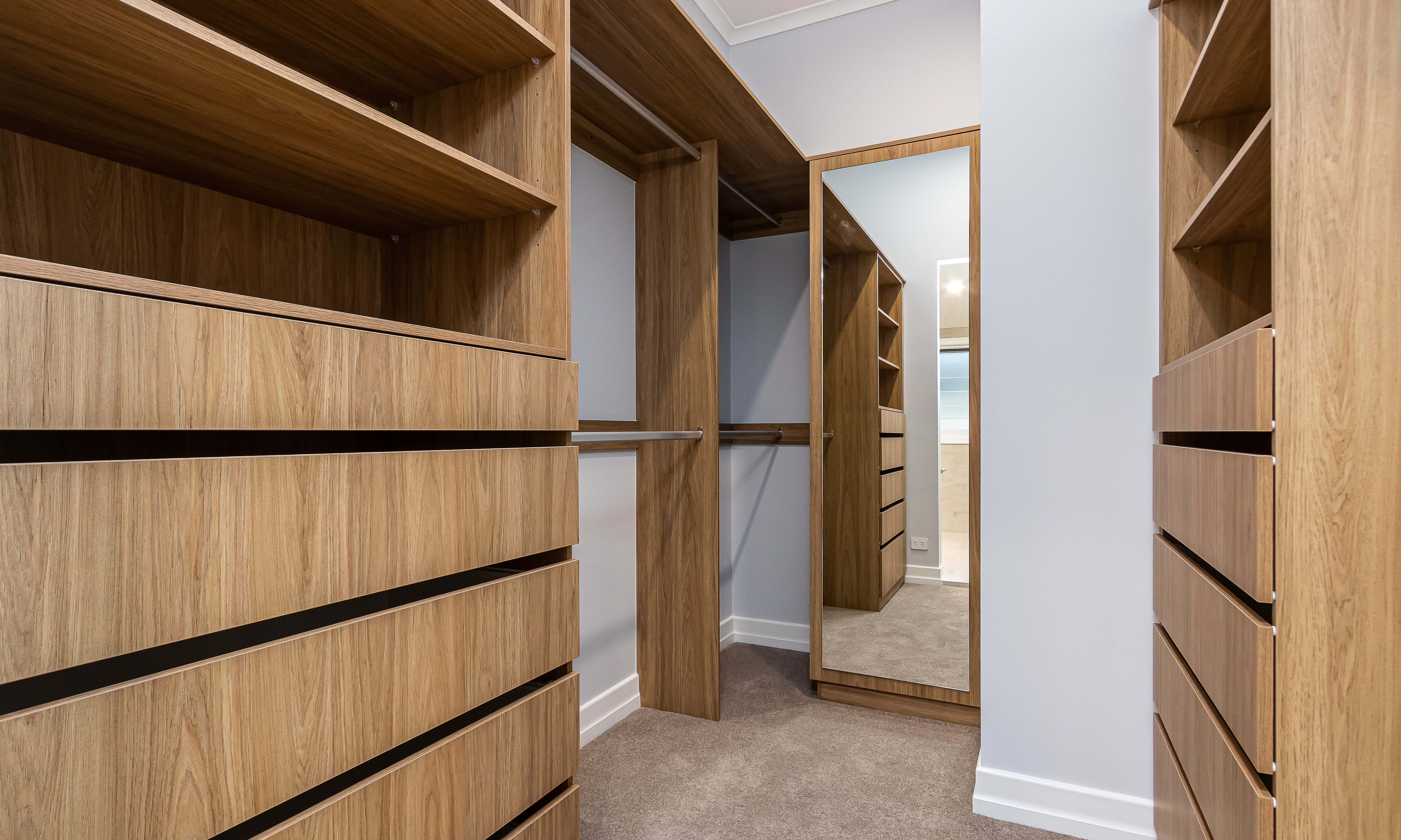 Timber Veneer Cabinetry in Walk in Robe 