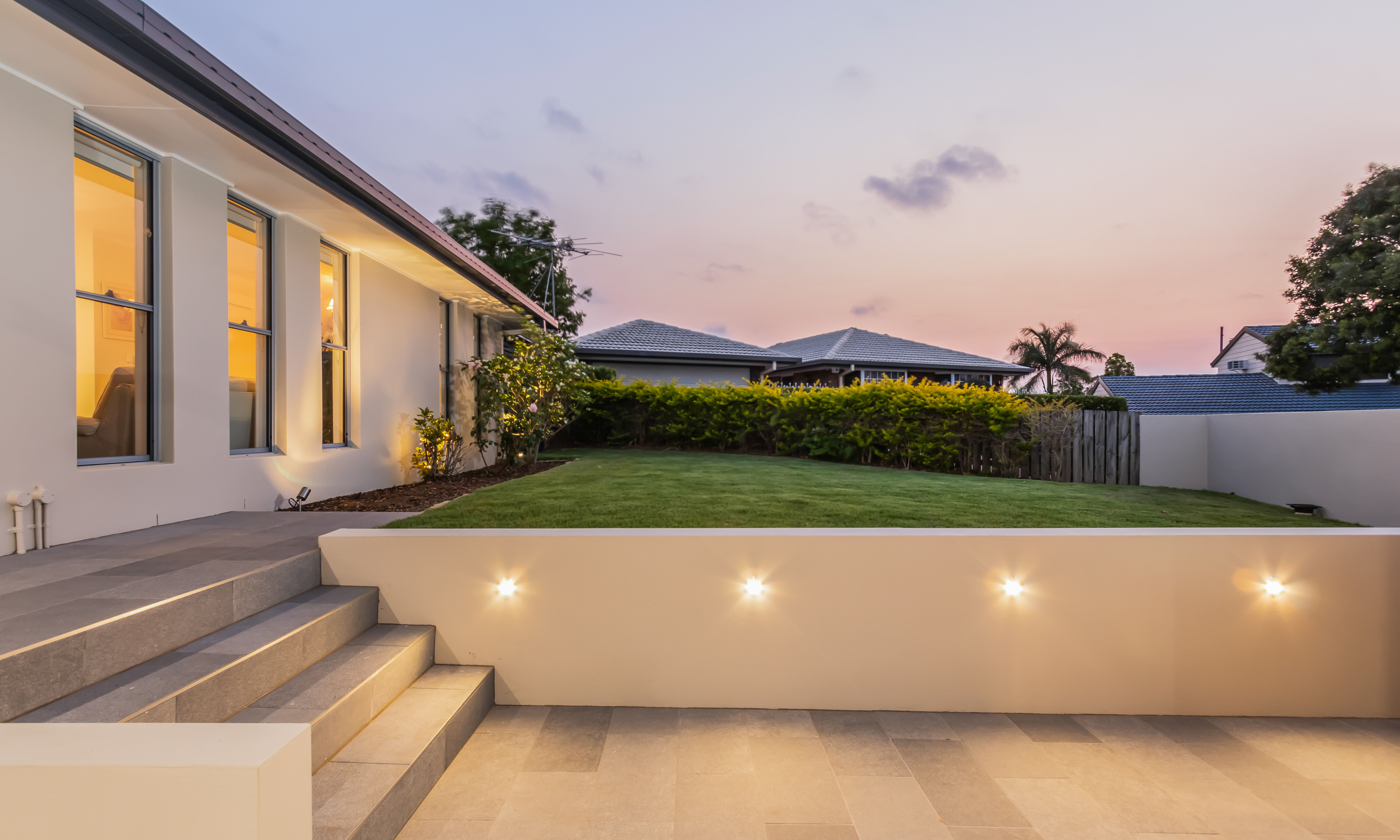 Magmarock feature tiles to pathway, Havit eyelid lights on retaining wall