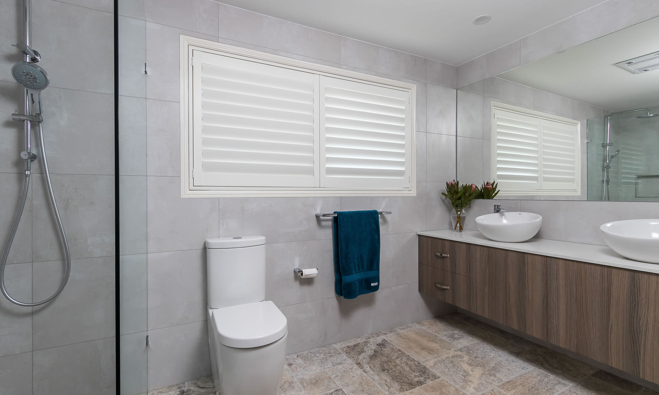 bathroom-travertine-vanity-shutters