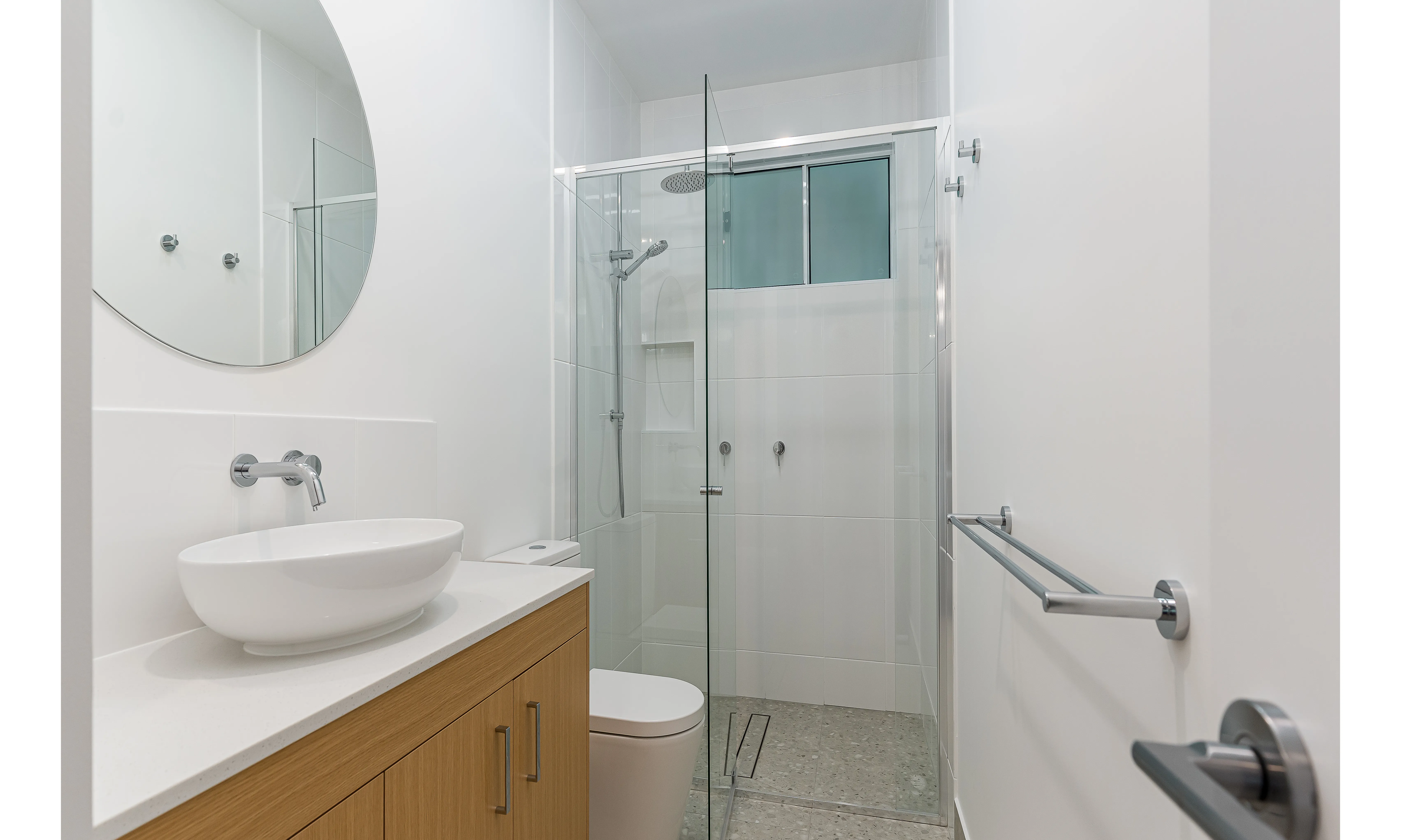 bathroom round mirror-vanity-above counter basin-shower screen