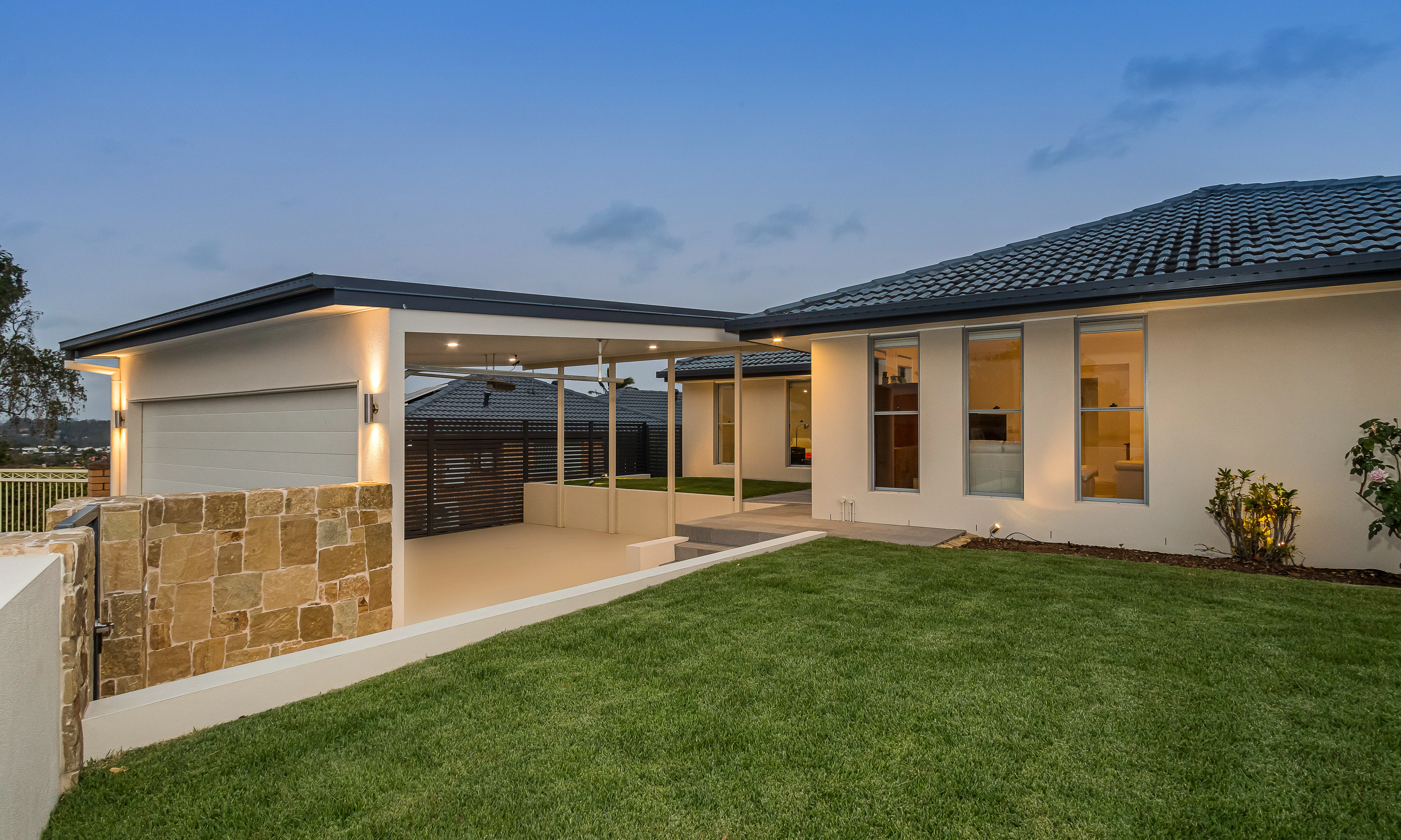 Rendered house, Clancy wall cladding, double carport 