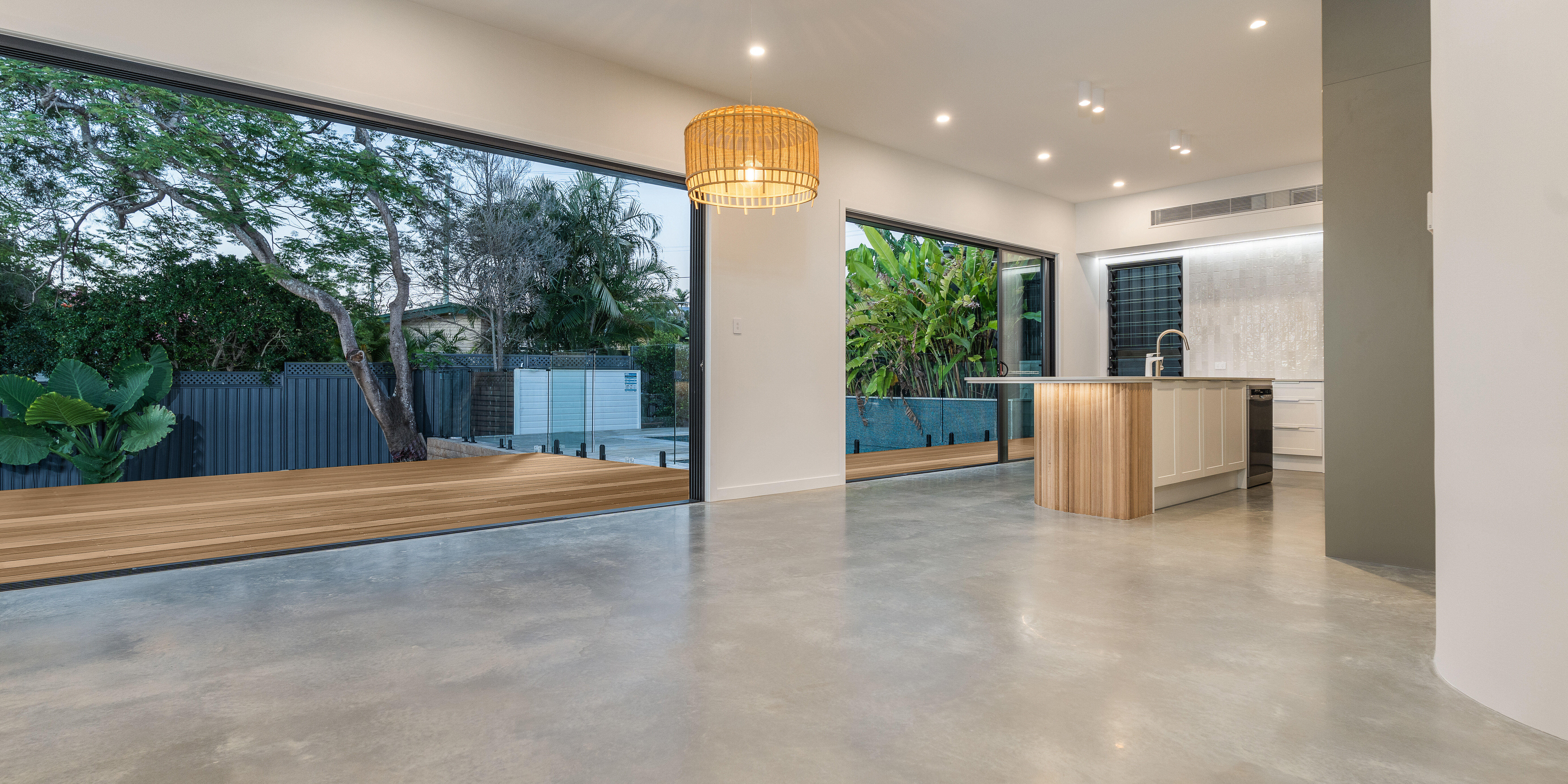 Living room-polished floors- Stacker door-pool-deck