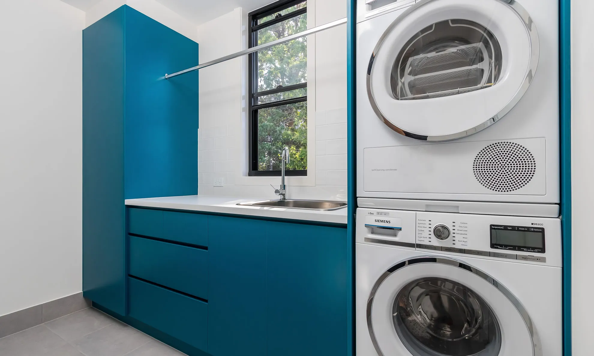 Laundry-blue cabinetry