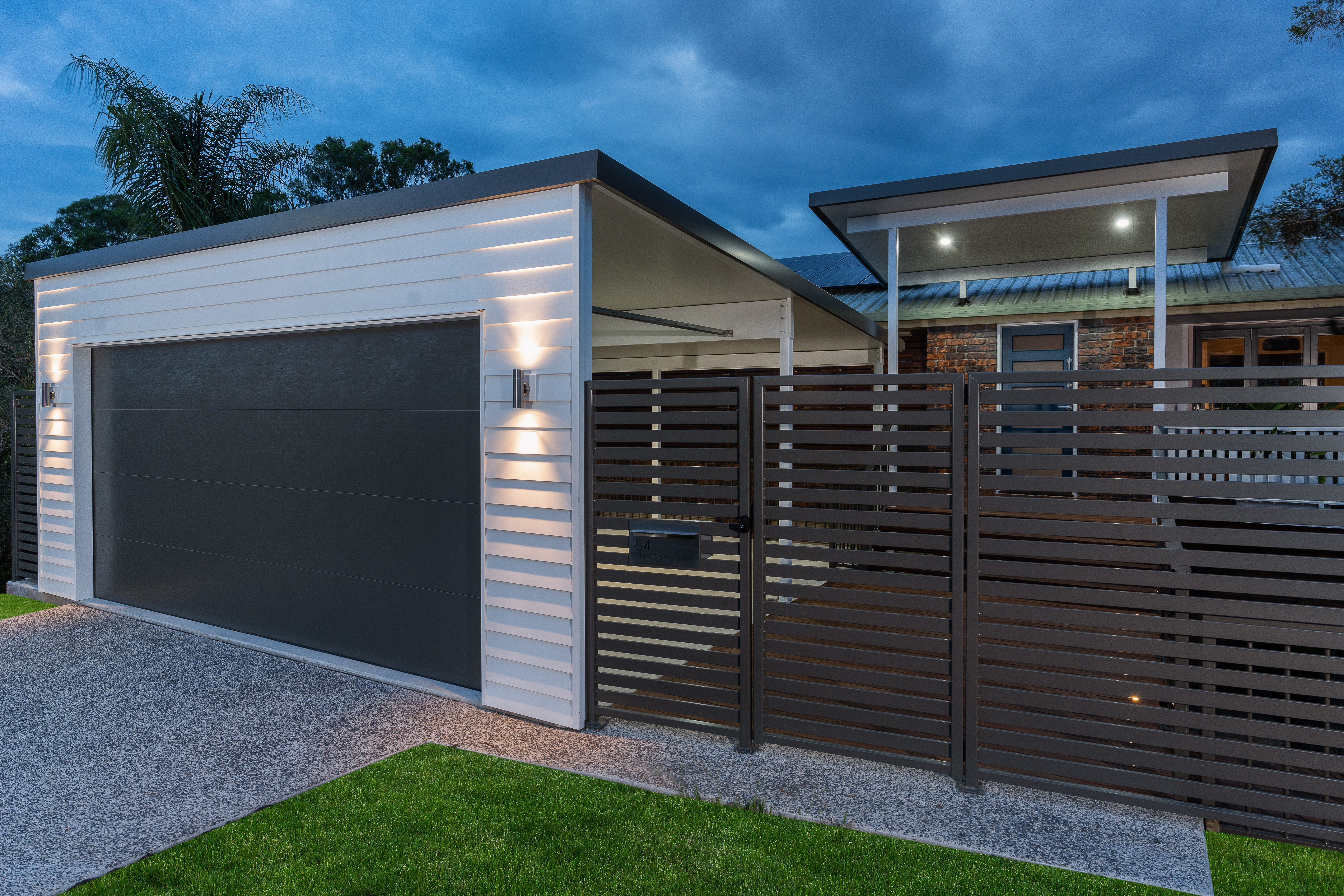 Carport and flyover roof at front entry