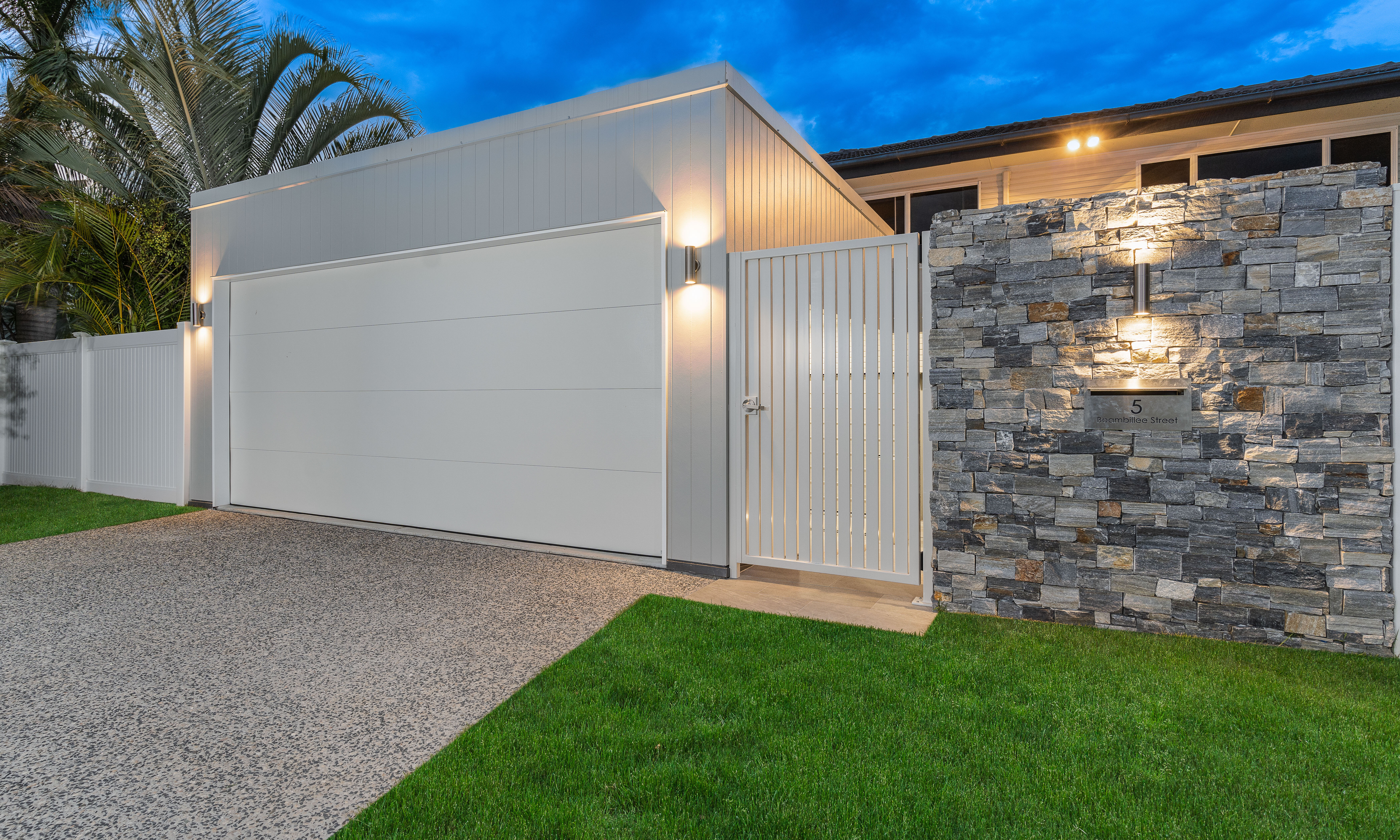 Carport-garage door-pedestrian gate-stone cladding-feature wall