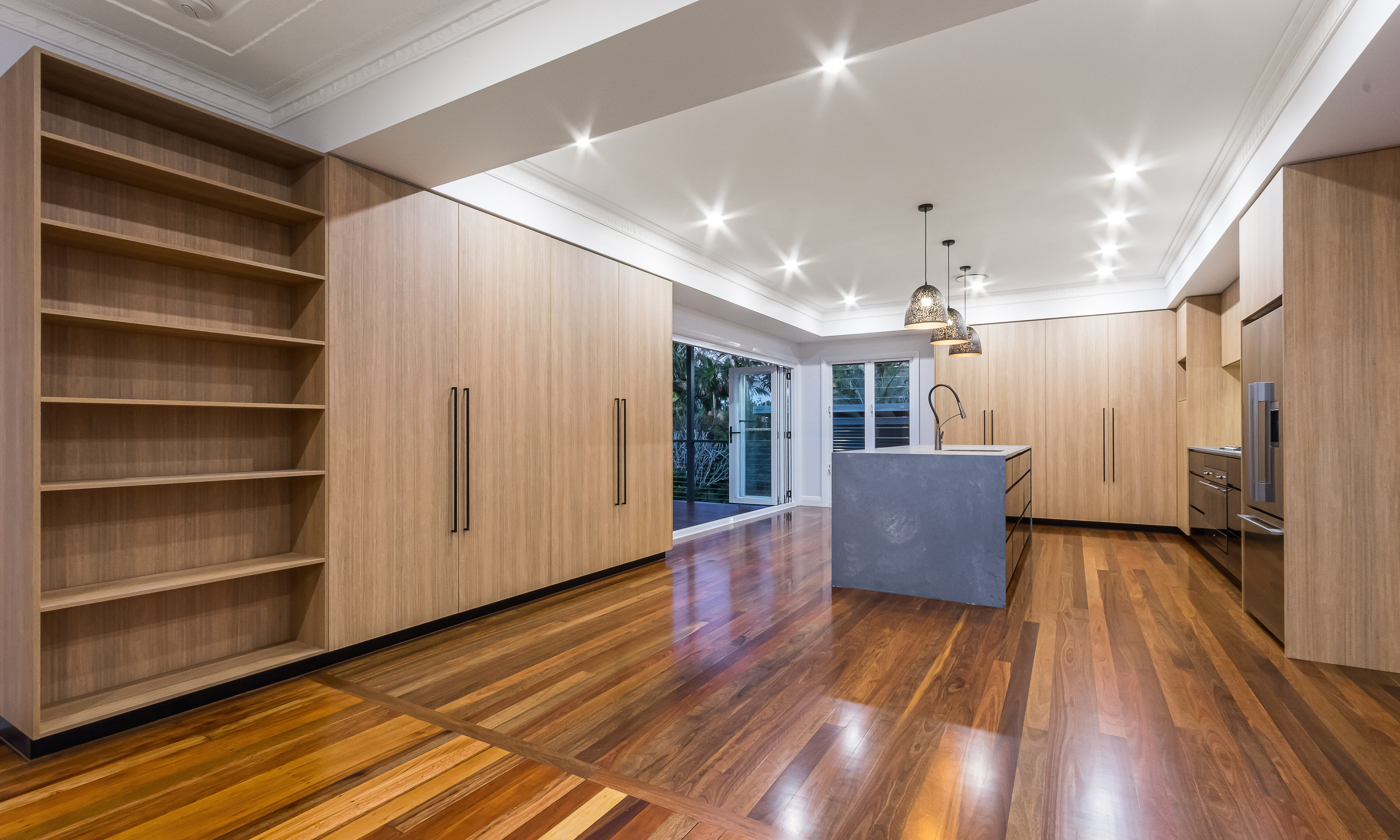 timber kitchen-marble tiles-splashback-stone benchtop- timber flooring- black handles