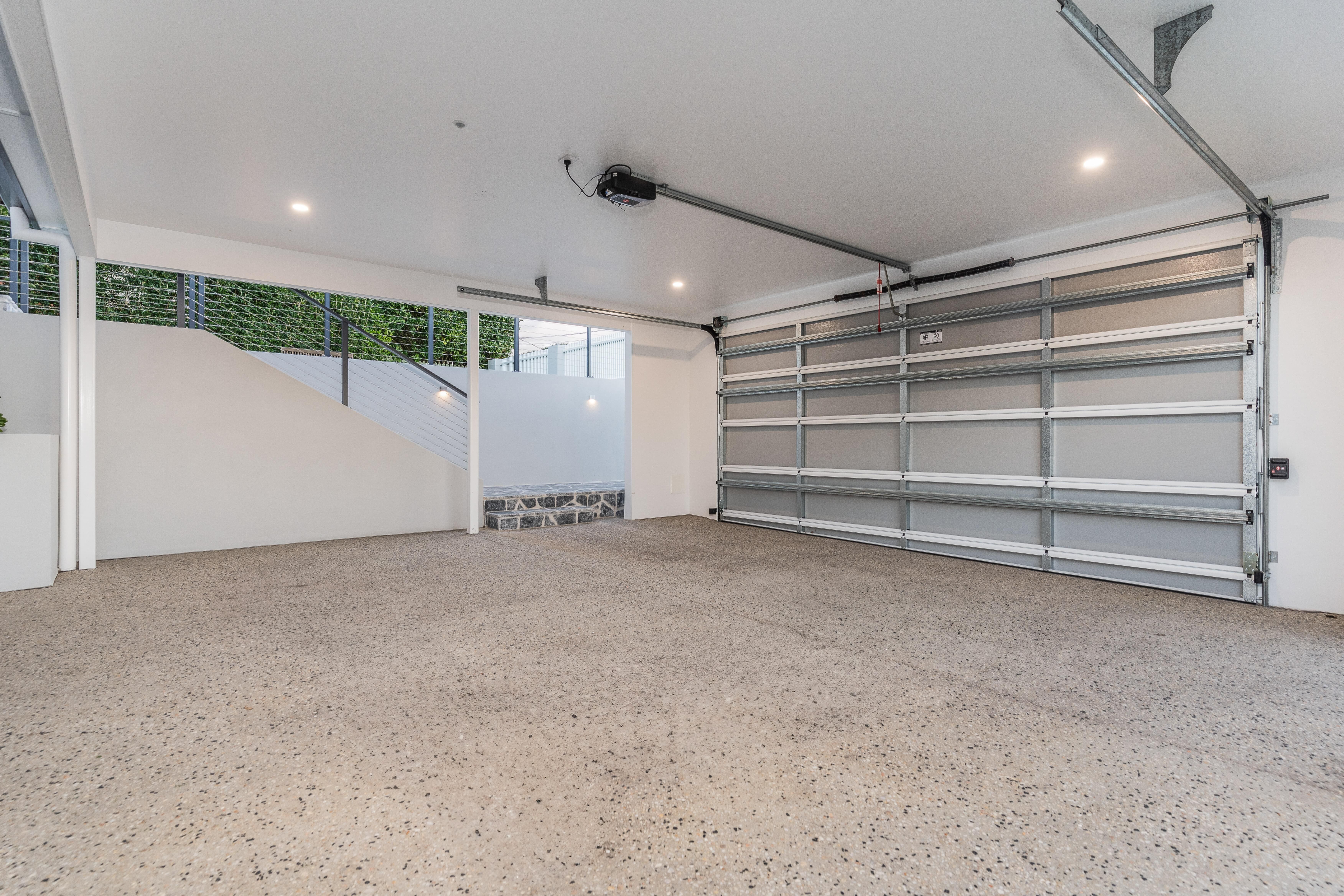 Tarragindi Carport, exposed concrete and wire balustrade