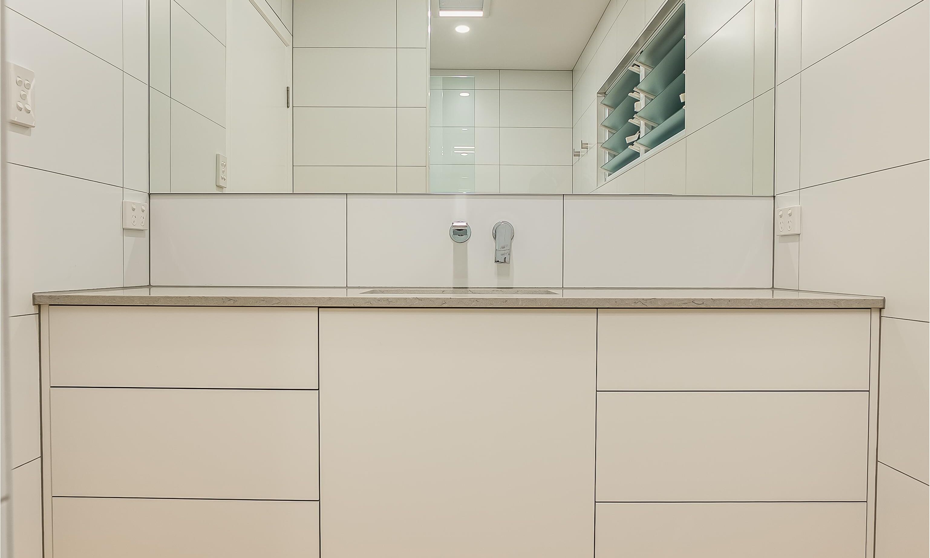 Gimba St, oversied mirror, feature floor tilesl, floating vanity