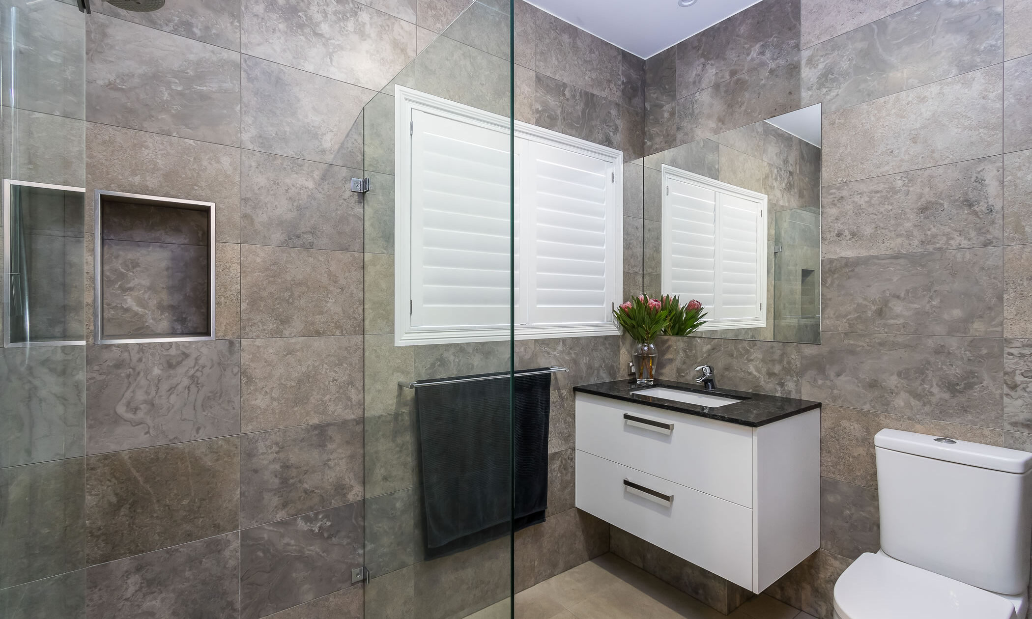 Bathroom-tiles to ceiling