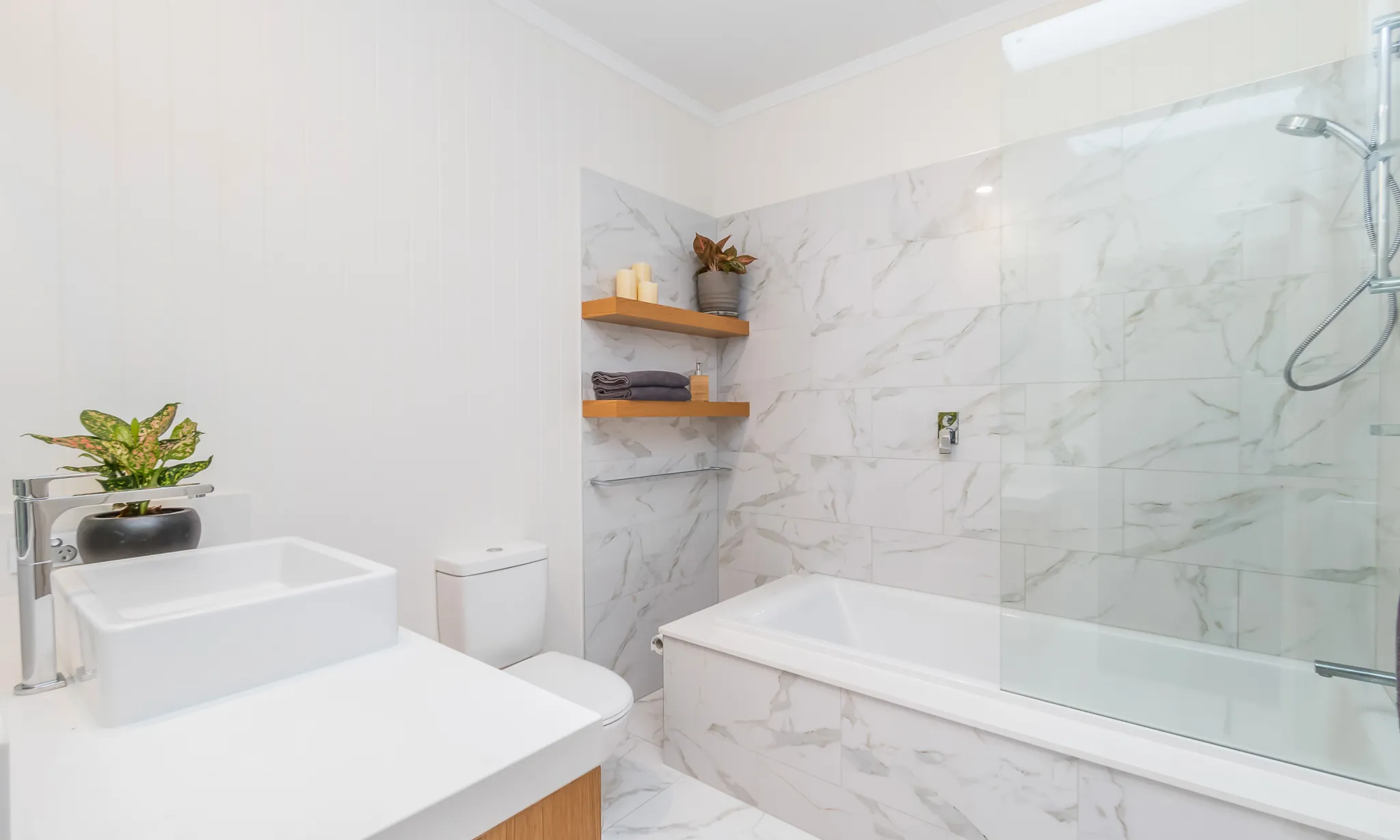 Bathroom Renovation-VJ walls-marble tiles-timber vanity-builtin bath