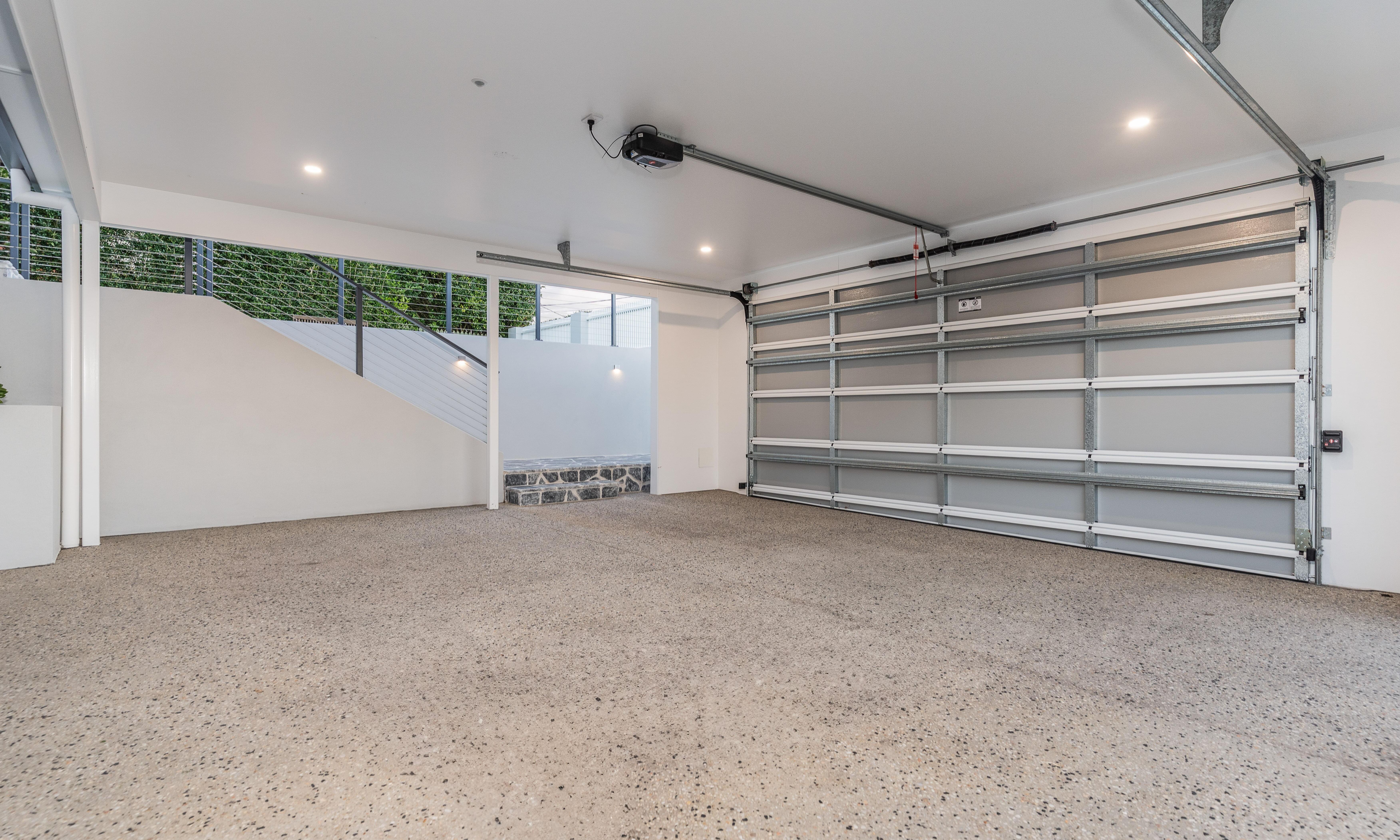 Tarragindi Carport, exposed concrete and wire balustrade