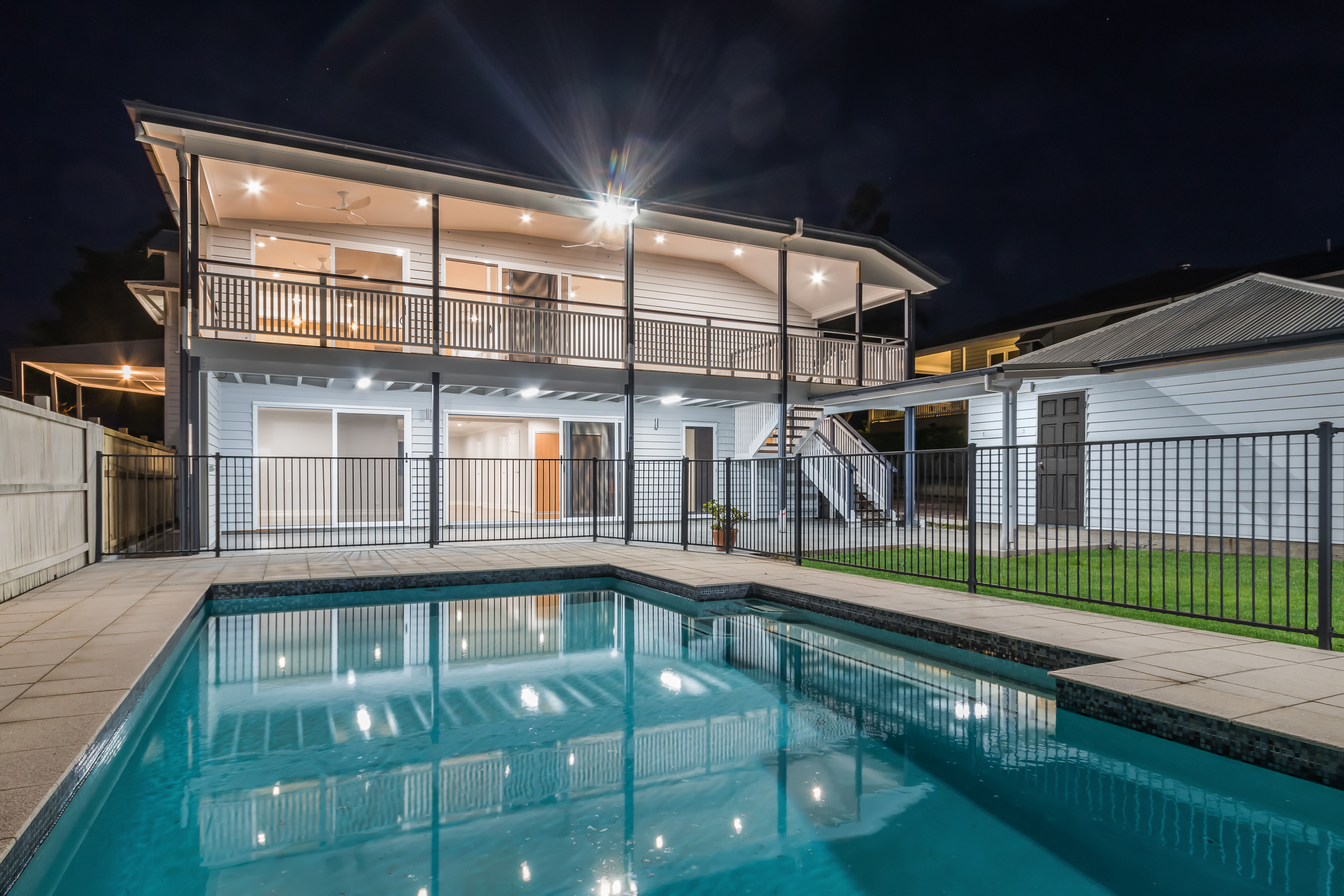 Inground Pool with aluminium balustrade and Deck with timber balustrade