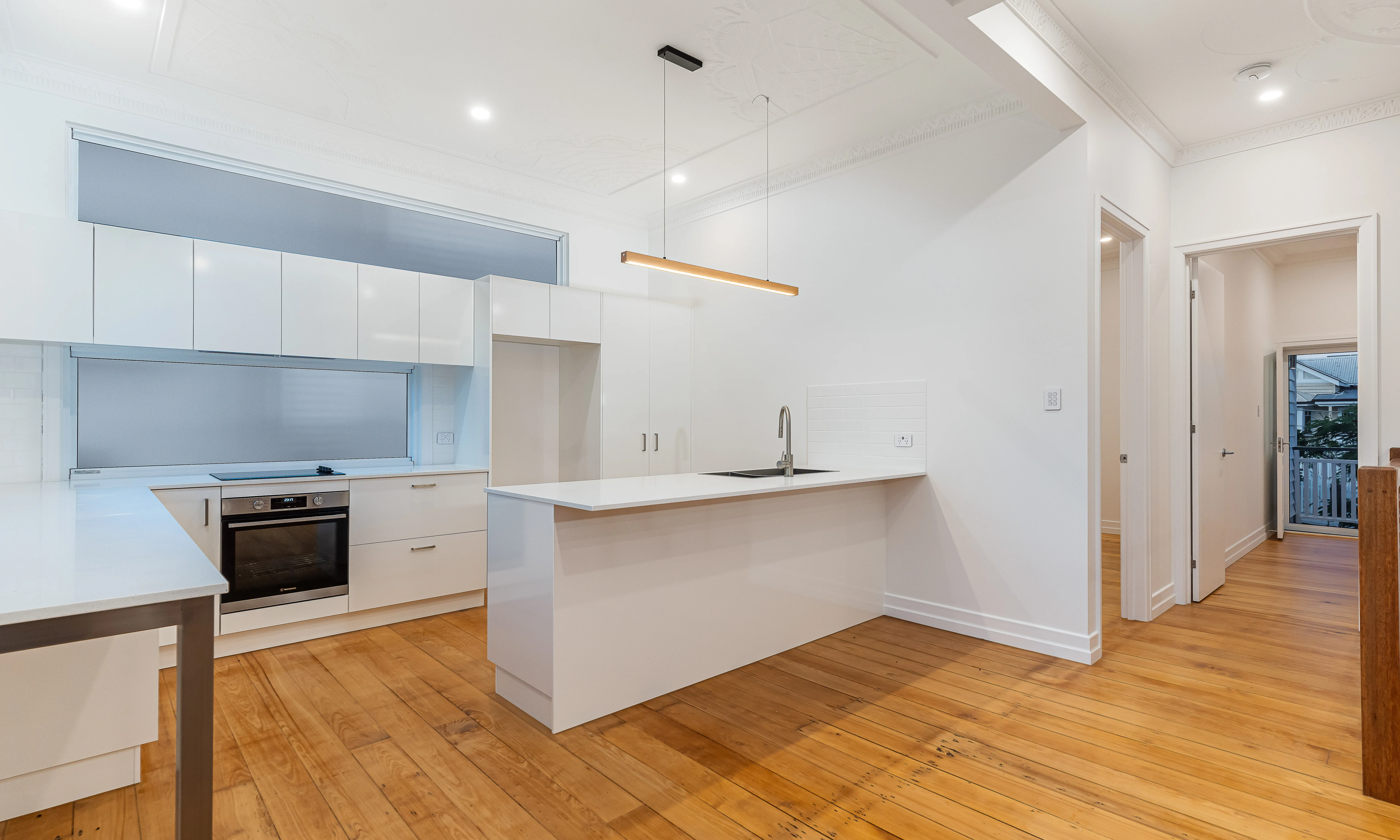 white kitchen-timber floors-pine flooring-cabinetry