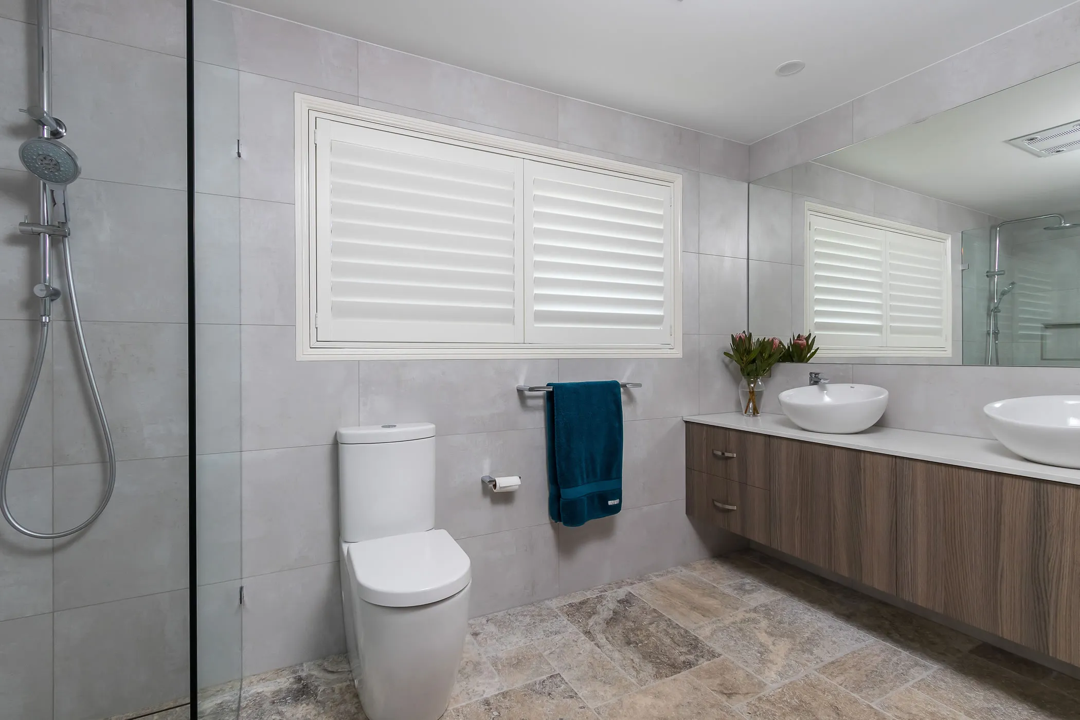 bathroom-travertine-vanity-shutters