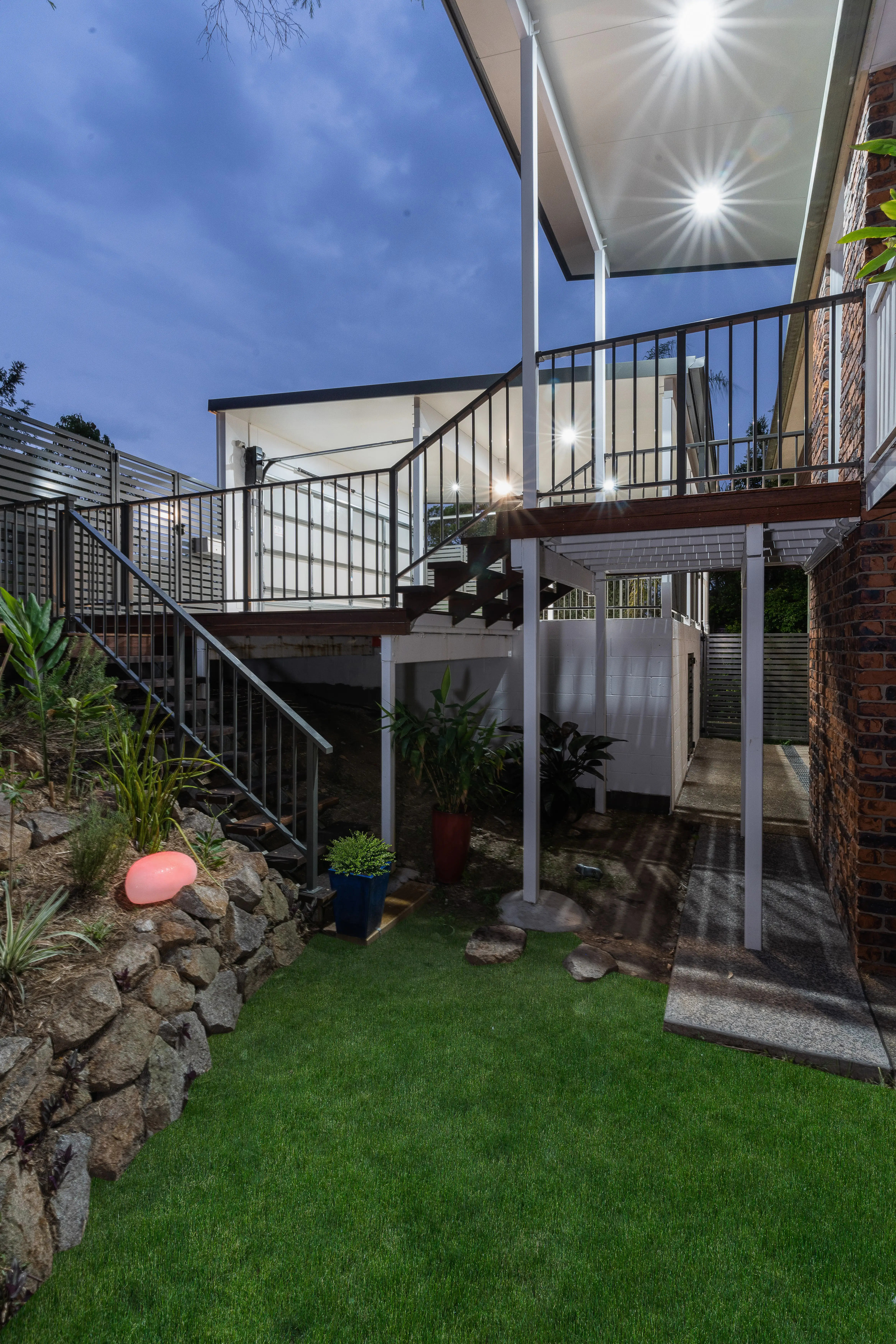 Lower level entry stairs and balustrade